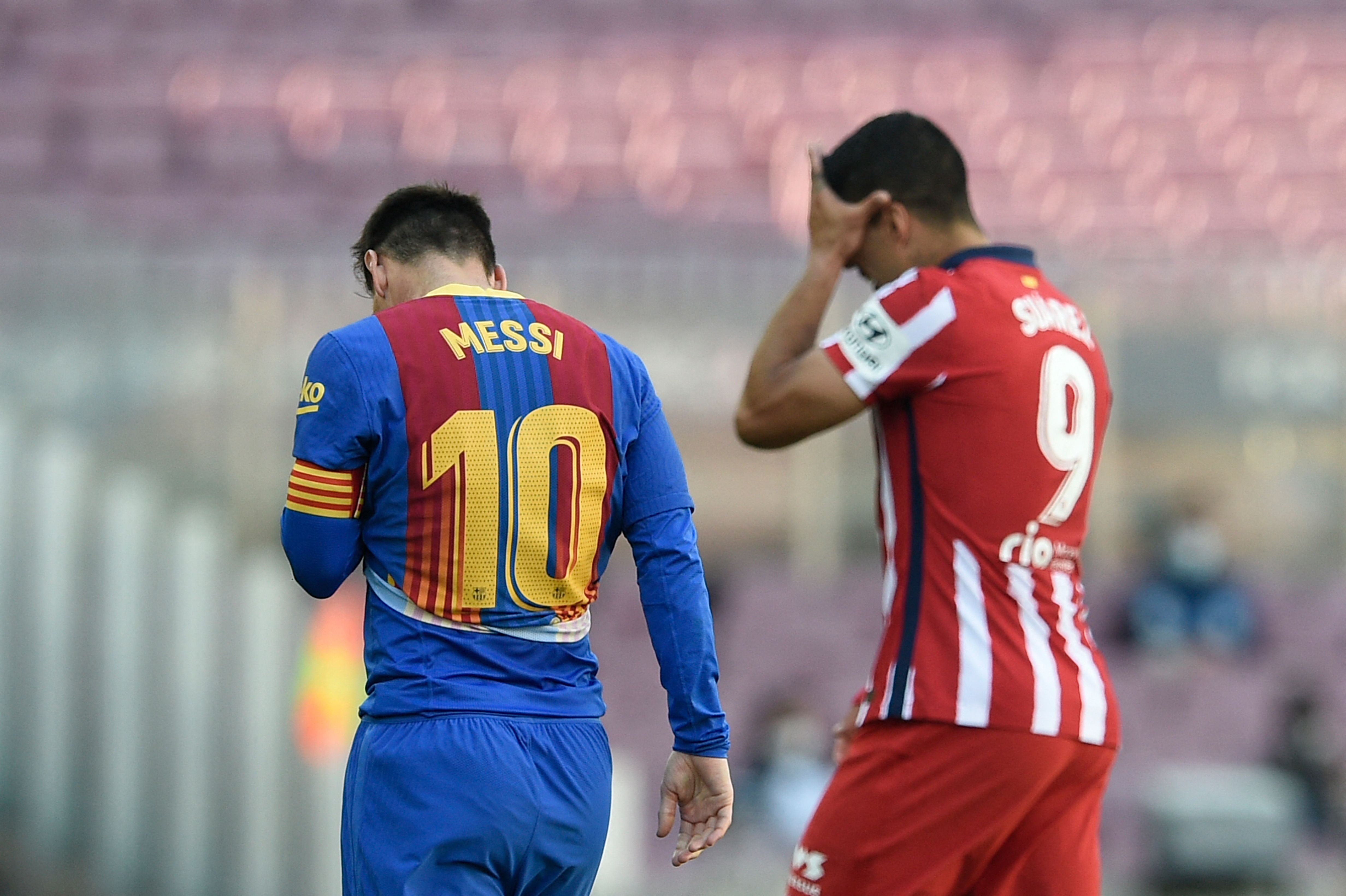 Messi y Suárez durante el partido del Barcelona y el Atlético de Madrid que finalizó igualado. (Foto Prensa Libre: AFP).