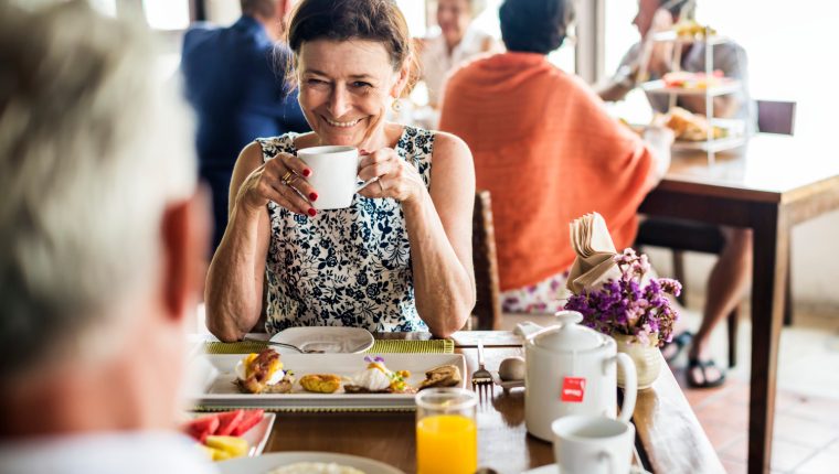 Guests eating breakfast at hotel
