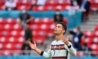 Budapest (Hungary), 15/06/2021.- Cristiano Ronaldo of Portugal reacts during the UEFA EURO 2020 group F preliminary round soccer match between Hungary and Portugal in Budapest, Hungary, 15 June 2021. (Hungría) EFE/EPA/Tibor Illyes / POOL (RESTRICTIONS: For editorial news reporting purposes only. Images must appear as still images and must not emulate match action video footage. Photographs published in online publications shall have an interval of at least 20 seconds between the posting.)