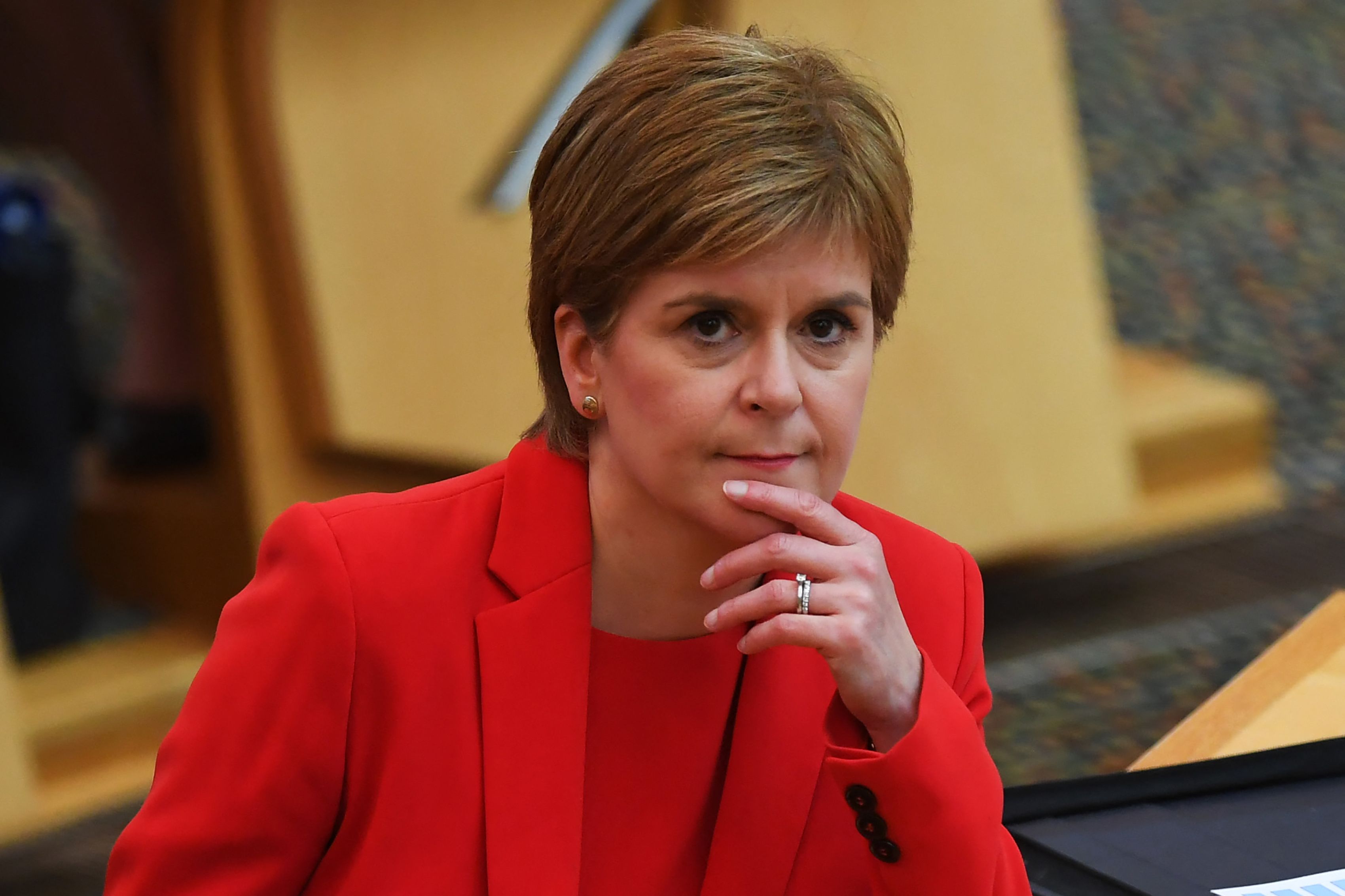 Scottish First Minister Nicola Sturgeon attends First Ministers Questions at the Scottish Parliament in Edinburgh, Scotland on June 3, 2021. (Photo by Andy Buchanan / POOL / AFP)