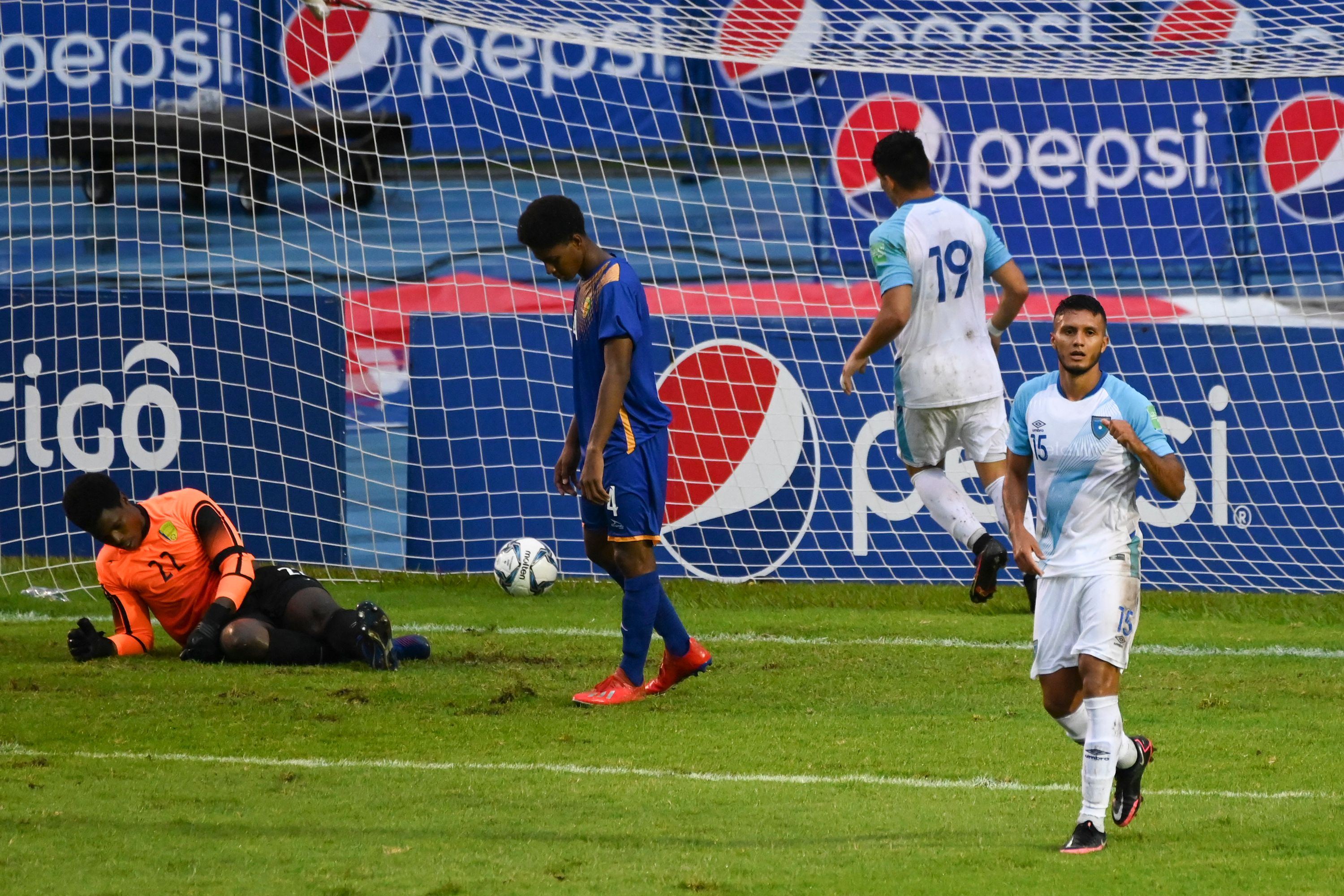 Guatemala's Jorge Vargas (R) celebrates after scoring against Saint Vincent and the Grenadines' during their 2022 FIFA World Cup CONCACAF qualifier football match at the Doroteo Guamuch stadium in Guatemala City, on June 4, 2021. (Photo by Johan ORDONEZ / AFP)