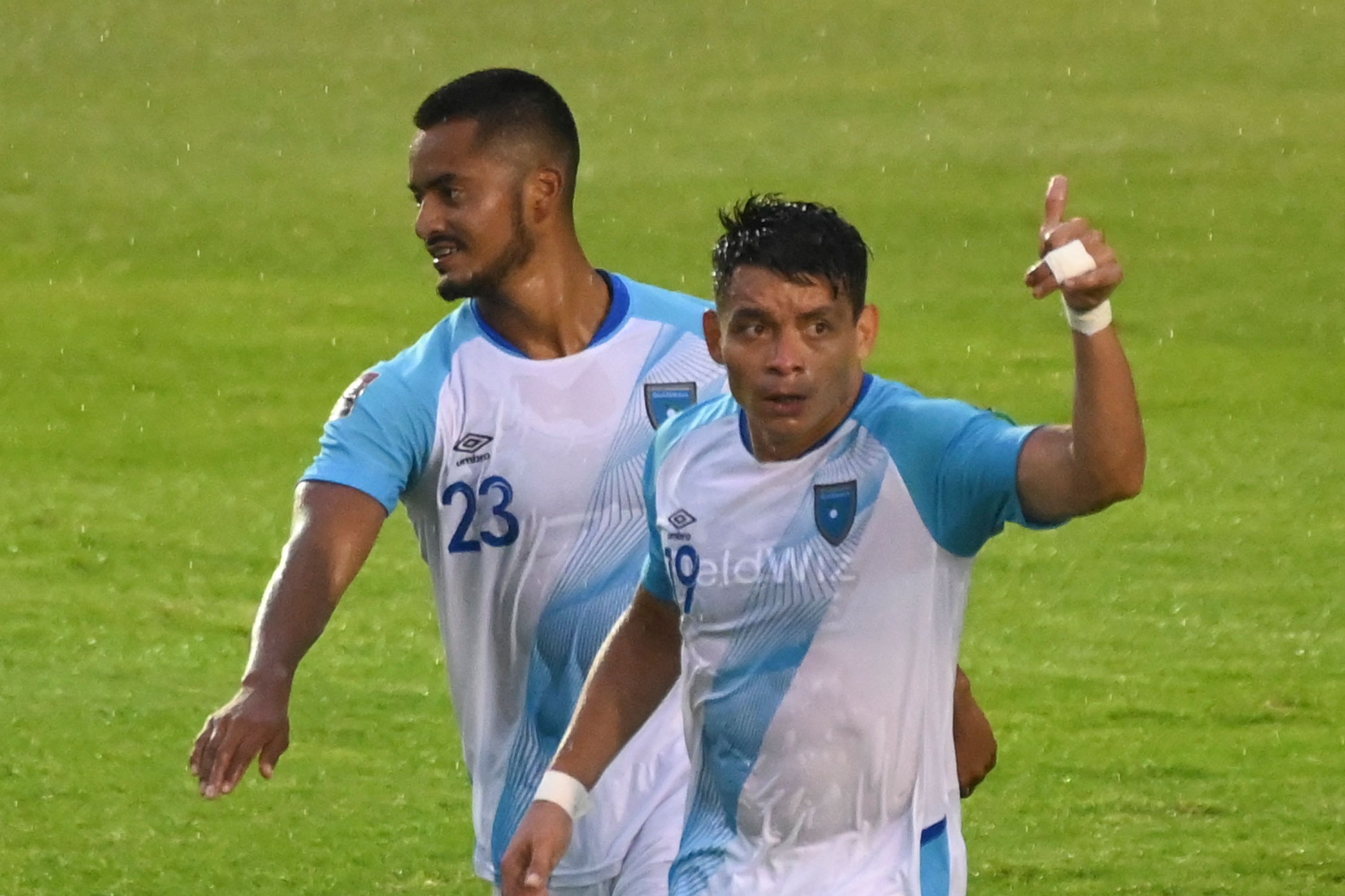 Guatemala's Robin Betancourth (R) celebrates after scoring against Saint Vincent and the Grenadines' during their 2022 FIFA World Cup CONCACAF qualifier football match at the Doroteo Guamuch stadium in Guatemala City, on June 4, 2021. (Photo by Johan ORDONEZ / AFP)