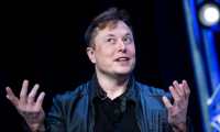 (FILES) In this file photo Elon Musk, speaks during the Satellite 2020 at the Washington Convention Center on March 9, 2020, in Washington, DC. - Tesla has abandoned a plan for an ultra-deluxe Plaid+ version of its Model S vehicle, according to founder Elon Musk. Musk said in a tweet on June 6, 2021 that the juiced-up Plaid is "just so good," that there is no need to go further with the Plaid+ model. (Photo by Brendan Smialowski / AFP)