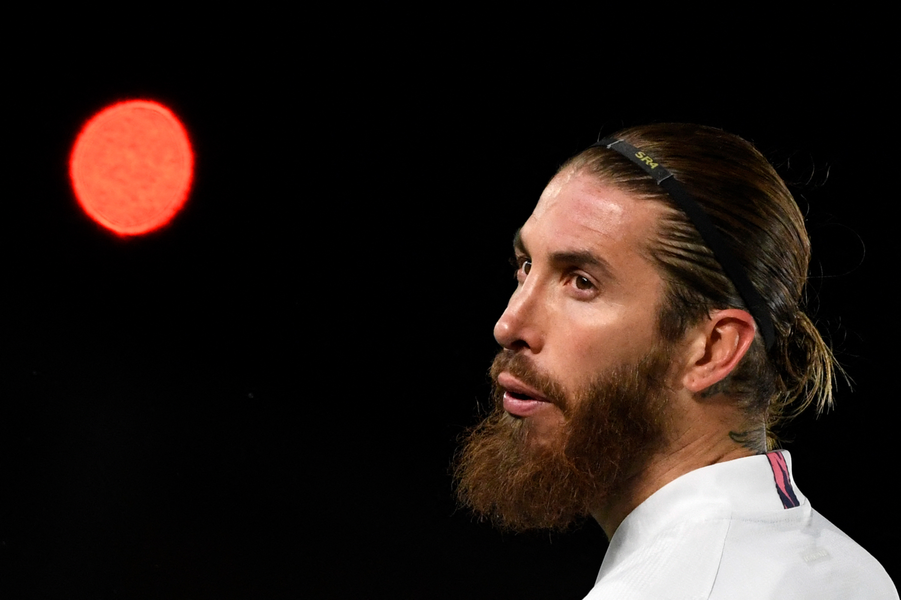 (FILES) In this file photo taken on March 16, 2021 Real Madrid's Spanish defender Sergio Ramos looks on during the UEFA Champions League round of 16 second leg football match between Real Madrid CF and Atalanta at the Alfredo di Stefano stadium in Valdebebas, on the outskirts of Madrid. (Photo by PIERRE-PHILIPPE MARCOU / AFP)