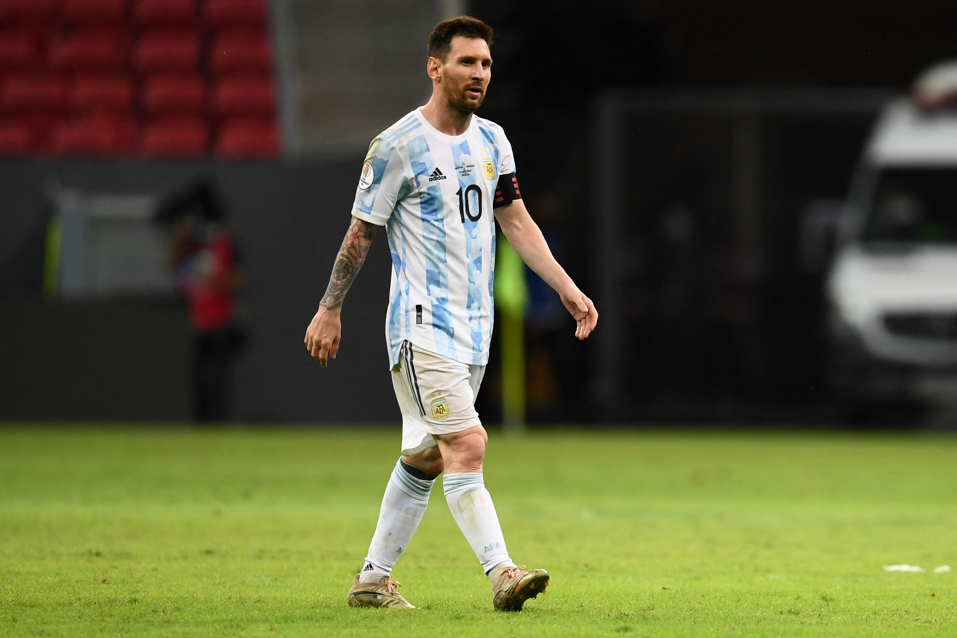 Argentina's Lionel Messi leaves the field after defeating Uruguay 1-0 in their Conmebol Copa America 2021 football tournament group phase match at the Mane Garrincha Stadium in Brasilia, on June 18, 2021. (Photo by EVARISTO SA / AFP)
