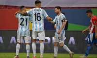 Argentina's Lionel Messi, Argentina's Joaquin Correa and Argentina's Angel Correa react at the end of the Conmebol Copa America 2021 football tournament group phase match between Argentina and Paraguay at the Mane Garrincha Stadium in Brasilia on June 21, 2021. (Photo by NELSON ALMEIDA / AFP)