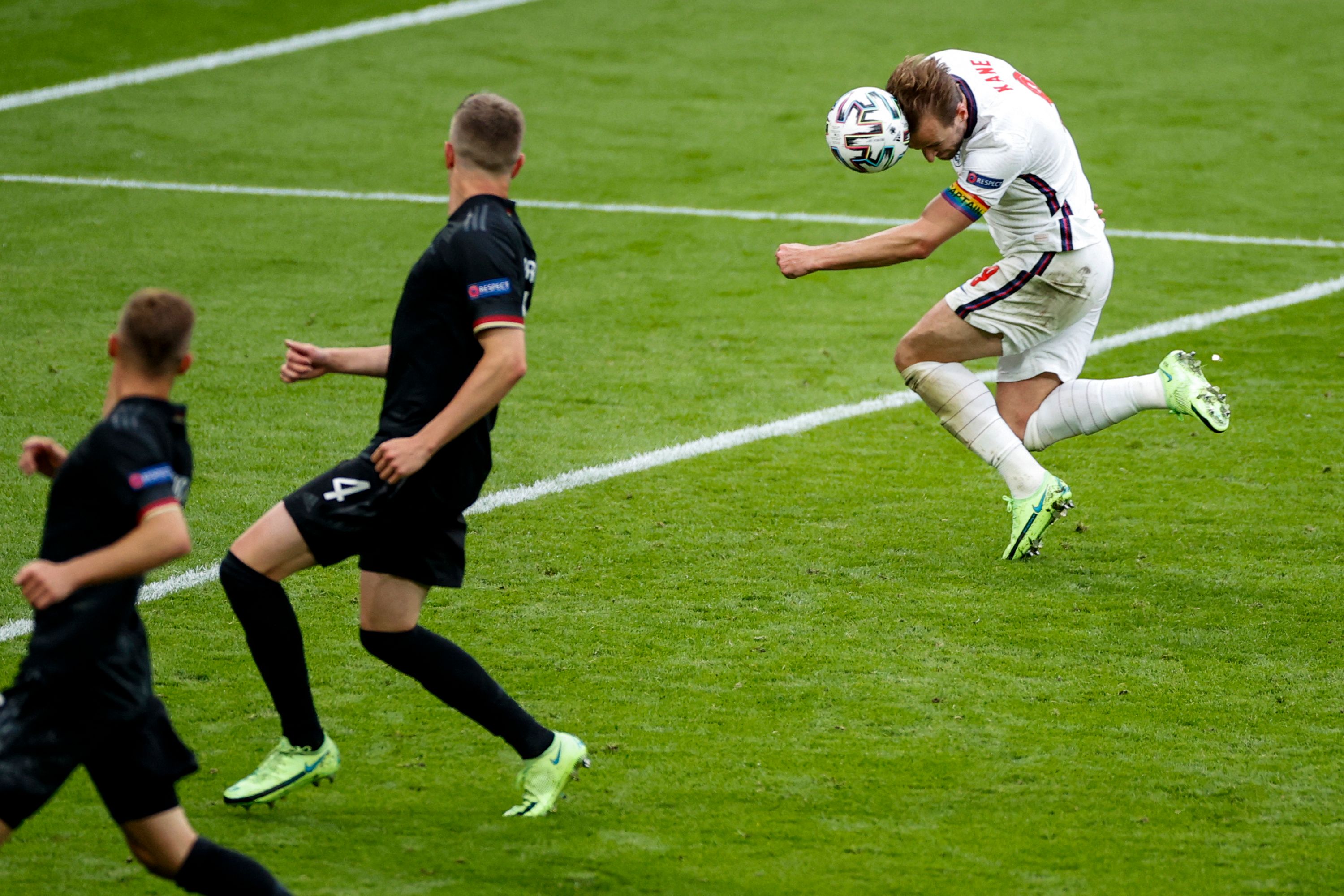 England's forward Harry Kane (R) scores the second goal during the UEFA EURO 2020 round of 16 football match between England and Germany at Wembley Stadium in London on June 29, 2021. (Photo by JOHN SIBLEY / POOL / AFP)
