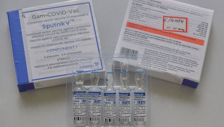 Vials of Sputnik V Covid-19 coronavirus vaccine are kept on a health worker's desk in a hospital in Bangalore on June 29, 2021. (Photo by Manjunath Kiran / AFP)