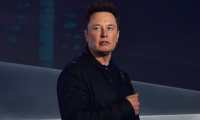 (FILES) In this file photo taken on November 21, 2019 Tesla co-founder and CEO Elon Musk introduces the newly unveiled all-electric battery-powered Tesla Cybertruck at Tesla Design Center in Hawthorne, California. - Tesla's market value hit $100 billion for the first time on January 22, 2020, triggering a payout plan that could be worth billions for Elon Musk, founder and chief of the electric carmaker. Shares in Tesla rose some 4.8 percent in opening trade to extend the gains in the value of the fast-growing maker of electric vehicles. (Photo by Frederic J. BROWN / AFP)