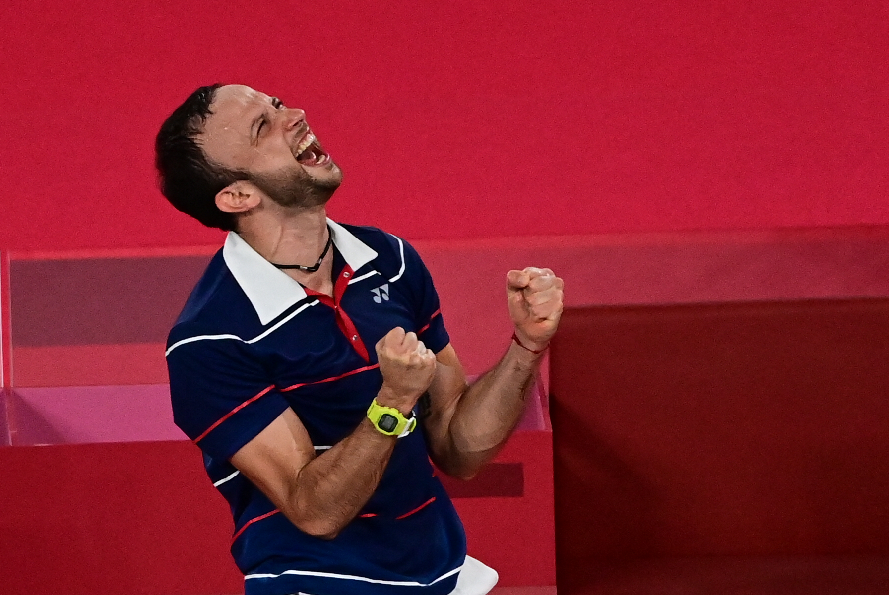 Guatemala's Kevin Cordon celebrates after beating South Korea's Heo Kwang-hee in their men's singles badminton quarter final match during the Tokyo 2020 Olympic Games at the Musashino Forest Sports Plaza in Tokyo on July 31, 2021. (Photo by Pedro PARDO / AFP)
