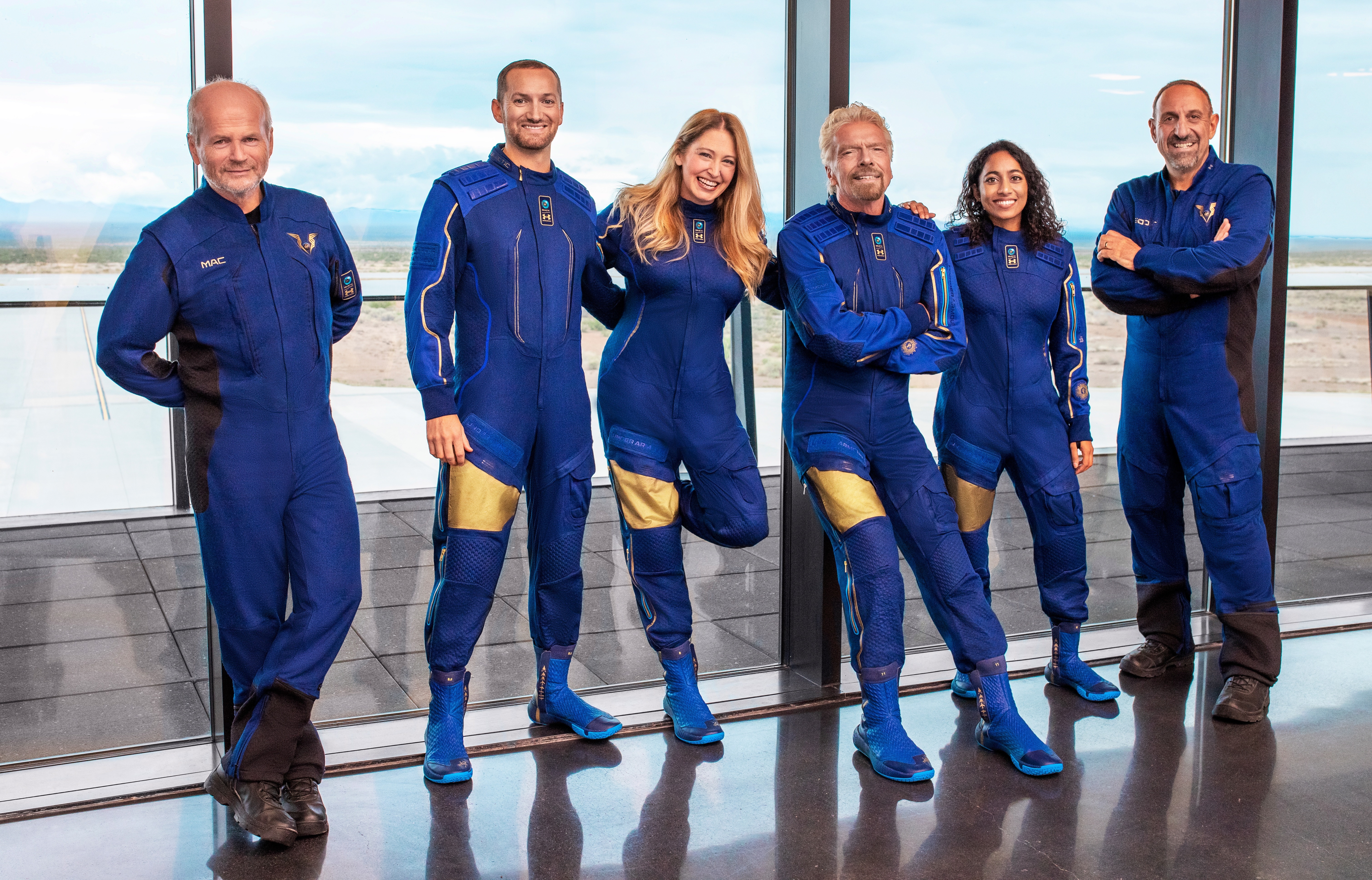 El equipo de Virgin Galactic, comandado por su fundador, el multimillonario Richard Branson. Foto: AFP