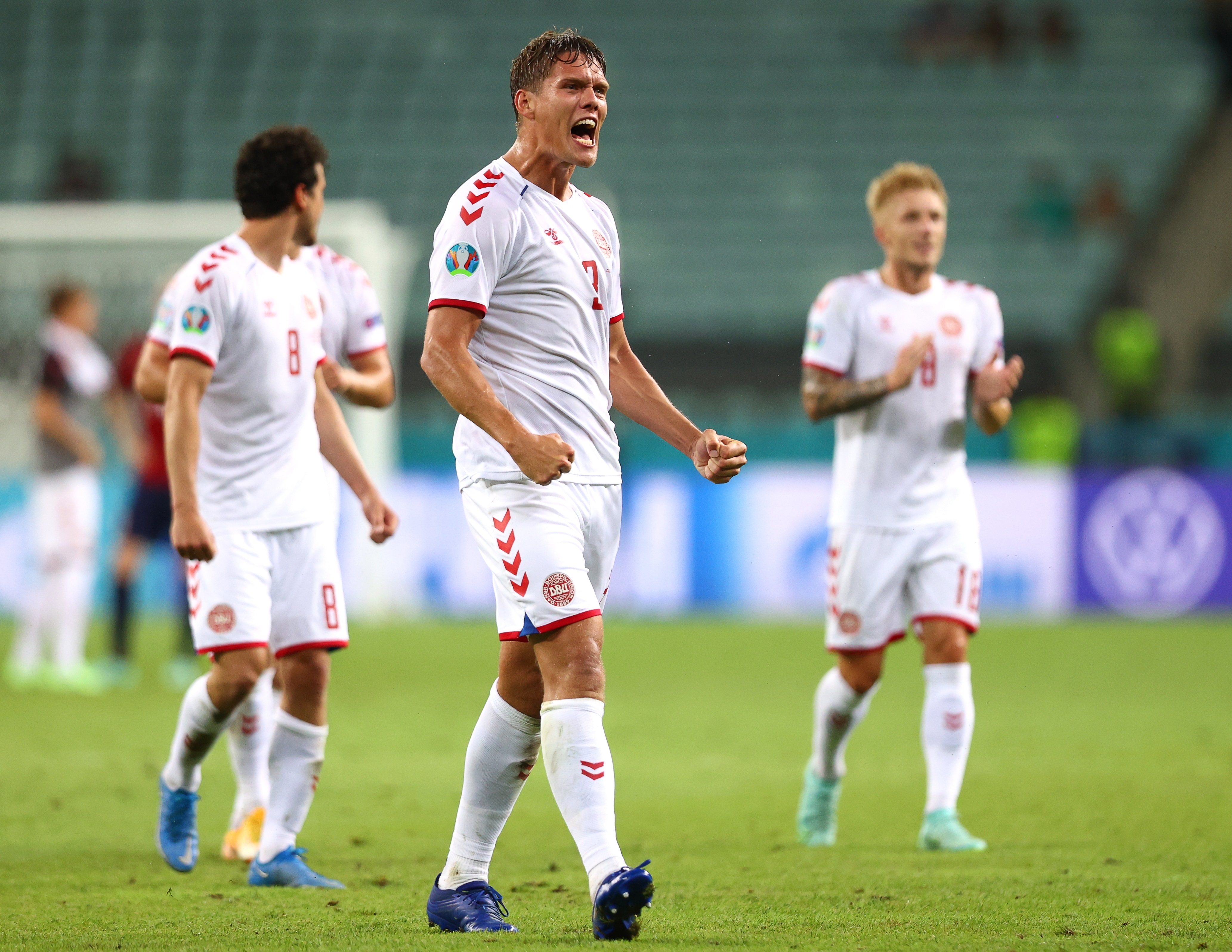 Baku (Azerbaijan), 03/07/2021.- Denmark's Jannik Vestergaard (C) and teammates celebrate after the UEFA EURO 2020 quarter final match between the Czech Republic and Denmark in Baku, Azerbaijan, 03 July 2021. (Azerbaiyán, República Checa, Dinamarca) EFE/EPA/Naomi Baker / POOL (RESTRICTIONS: For editorial news reporting purposes only. Images must appear as still images and must not emulate match action video footage. Photographs published in online publications shall have an interval of at least 20 seconds between the posting.)