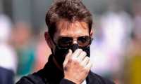 Silverstone (United Kingdom), 18/07/2021.- US actor Tom Cruise wears a protective face mask at the grid prior to the Formula One Grand Prix of Great Britain at the Silverstone Circuit in Northamptonshire, Britain, 18 July 2021. (Fórmula Uno, Gran Bretaña, Reino Unido) EFE/EPA/Lars Baron / POOL