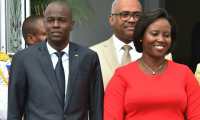 Haitian President Jovenel Moise (L) and Haitian First Lady Martine Moise are seen at the National Palace in Port-au-Prince, Haiti on May 23, 2018. - Haiti President Jovenel Moise was assassinated and his wife wounded early July 7, 2021 in an attack at their home, the interim prime minister announced, an act that risks further destabilizing the Caribbean nation beset by gang violence and political volatility. Claude Joseph said he was now in charge of the country and urged the public to remain calm, while insisting the police and army would ensure the population's safety."The president was assassinated at his home by foreigners who spoke English and Spanish," Joseph said of the assault that took place around 1:00 am (0500 GMT) and left the president's wife hospitalized. (Photo by HECTOR RETAMAL and HECTOR RETAMAL / AFP)