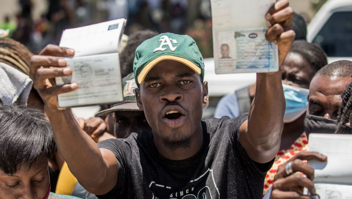 Haitian citizens gather in front of the US Embassy in Tabarre, Haiti on July 10, 2021, asking for asylum after the assassination of President Jovenel Moise explaining that there is too much insecurity in the country and that they fear for their lives. - The widow of slain Haitian leader Jovenel Moise, who was critically wounded in the attack that claimed his life, issued her first public remarks since the assault, calling on the nation not to 