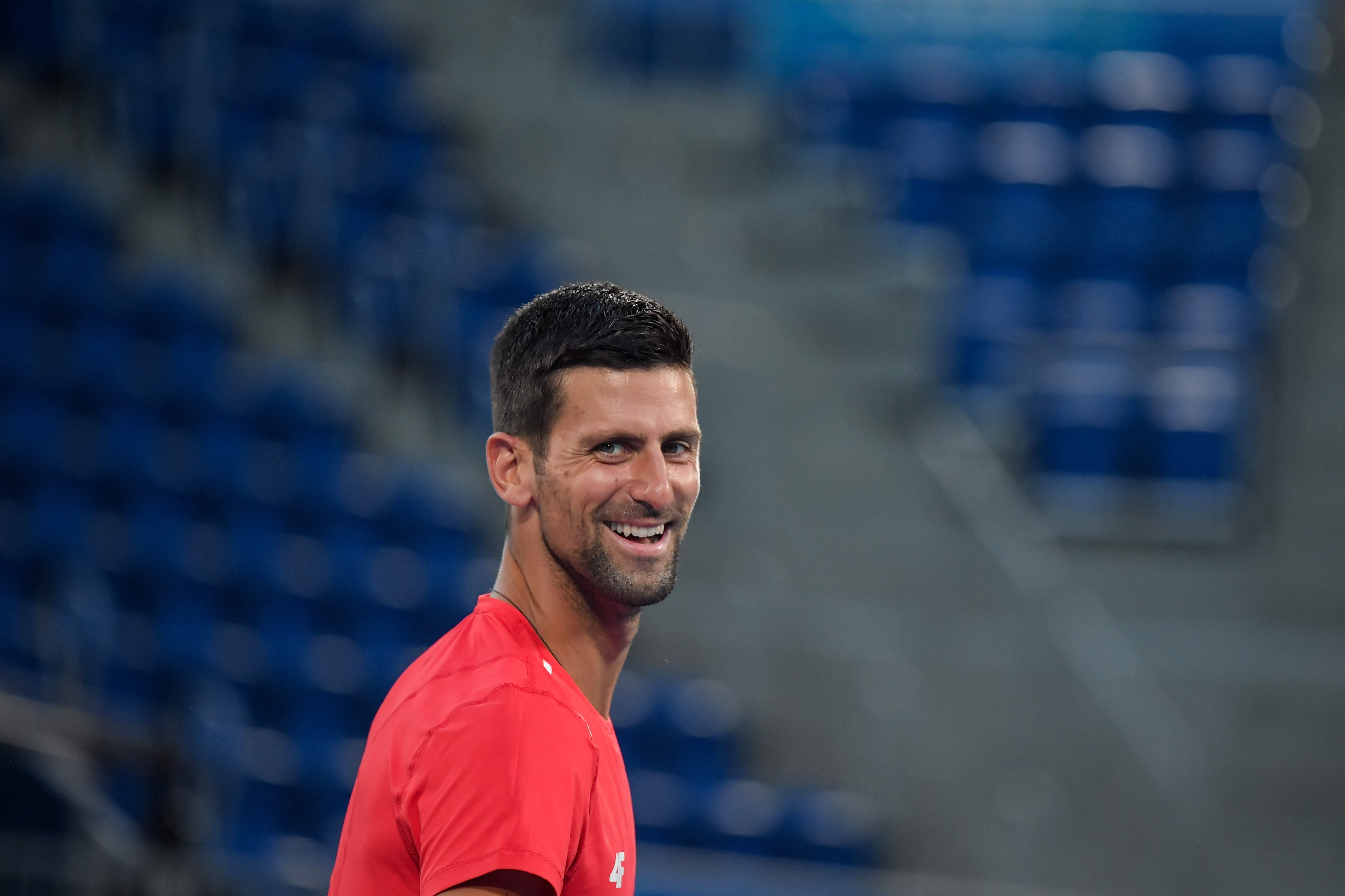 Serbia's Novak Djokovic attends a training session at the Ariake Tennis Park ahead of the Tokyo 2020 Olympic Games in Tokyo on July 21, 2021. (Photo by Tiziana FABI / AFP)