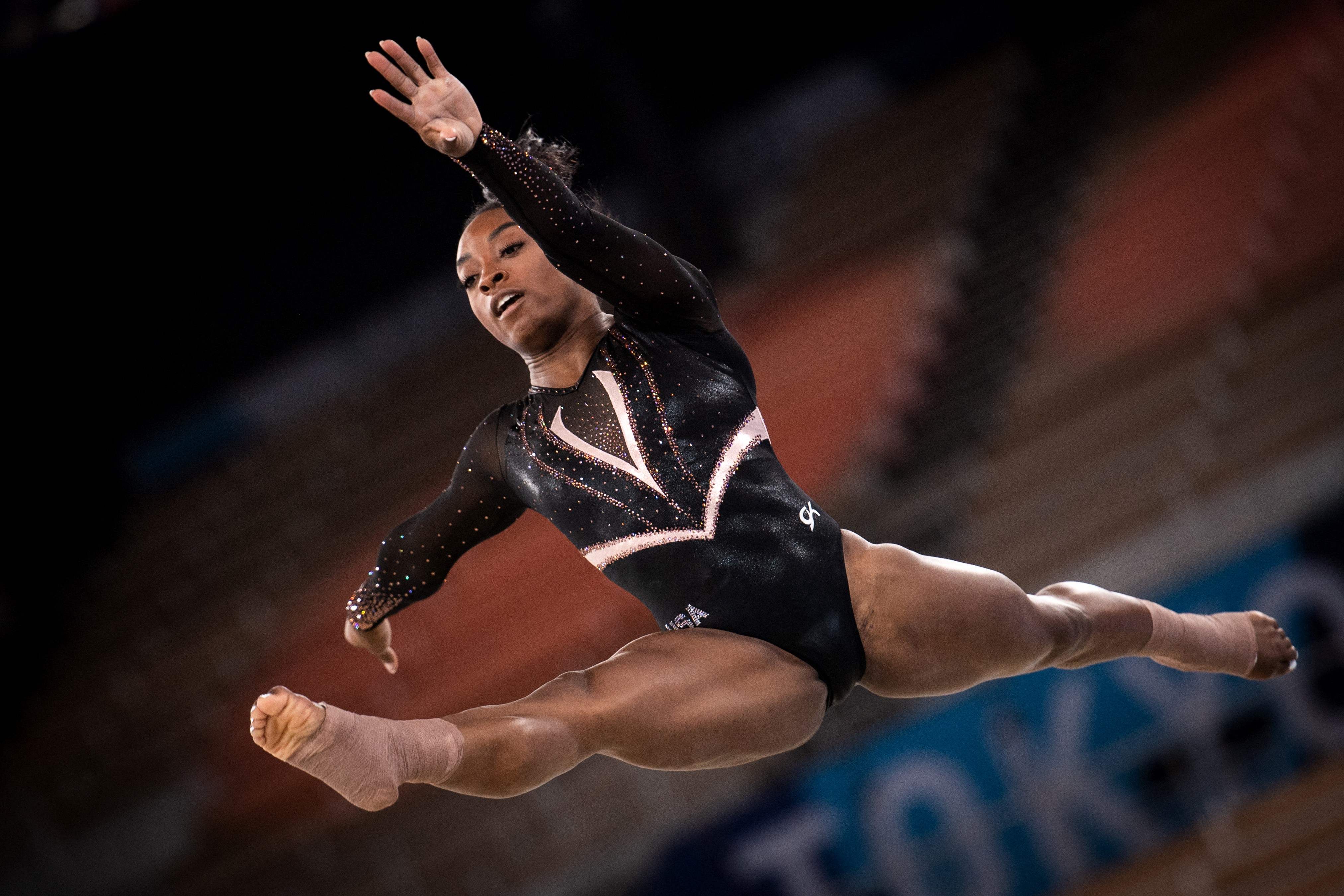US gymnast Simone Biles practices the floor during a training session at the Ariake Gymnastics Centre in Tokyo on July Tokyo, on July 22, 2021, a few days prior to the beginning of the 2020 Tokyo Olympic games. (Photo by Loic VENANCE / AFP)