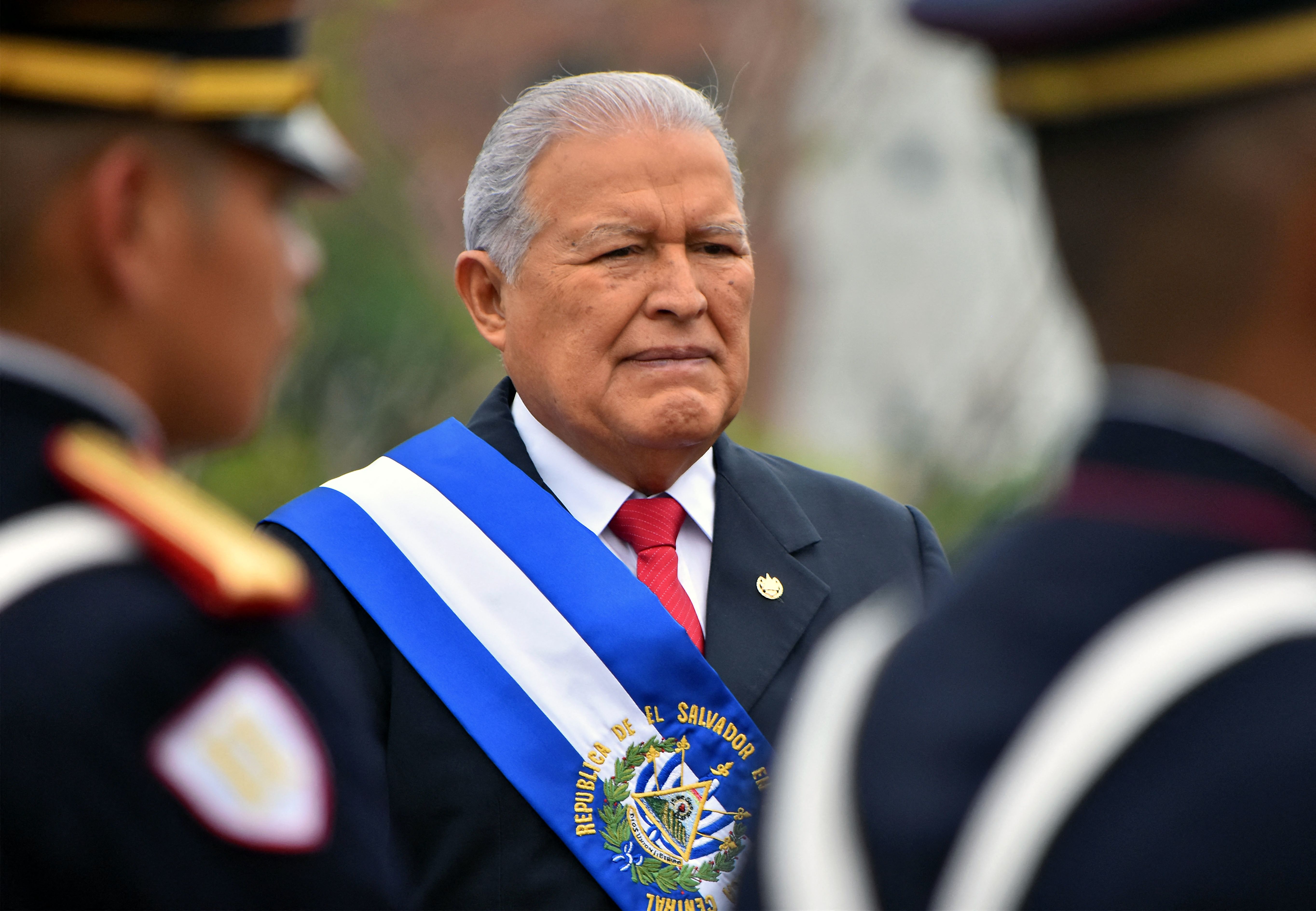 (FILES) In this file photo taken on June 01, 2018, Salvadoran President Salvador Sanchez Ceren stands after delivering the annual address to the nation on his fourth year in office to the legislature in San Salvador. - A Salvadoran judge on July 28, 2021 ordered the preventive detention of Former President Salvador Sánchez Cerén (2014-2019) for illicit enrichment and money laundering, the Attorney General's Office said. (Photo by Oscar Rivera / AFP)