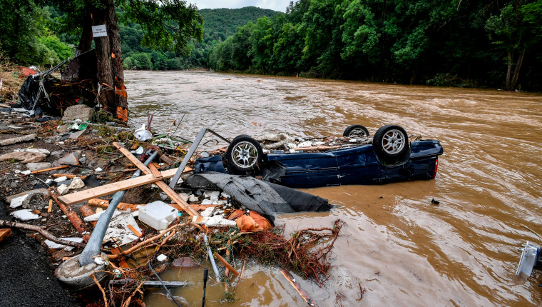 Schuld (Germany), 15/07/2021.- A destroyed car lies in the Ahr river after heavy flooding in Schuld, Germany, 15 July 2021. Large parts of Western Germany were hit by heavy, continuous rain in the night to 15 July resulting in local flash floods that destroyed buildings and swept away cars. (Inundaciones, Alemania) EFE/EPA/SASCHA STEINBACH