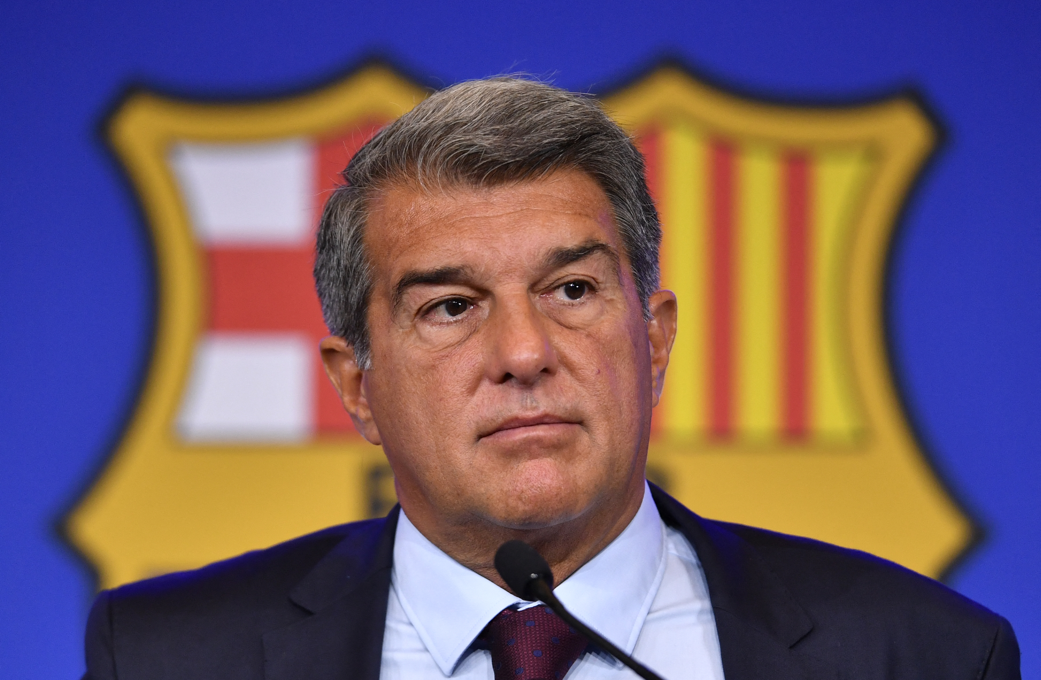 President of FC Barcelona Joan Laporta holds a press conference at the Camp Nou stadium in Barcelona on August 6, 2021 to explain Lionel Messi exit. Soccer star Lionel Messi will leave FC Barcelona after discussions for a new contract failed due to financial and structural obstacles. (Photo by Pau BARRENA / AFP)