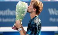 MASON, OHIO - AUGUST 22: Alexander Zverev of Germany poses with the winner's trophy after defeating Andrey Rublev of Russia during the final of the Western & Southern Open at Lindner Family Tennis Center on August 22, 2021 in Mason, Ohio.   Matthew Stockman/Getty Images/AFP
== FOR NEWSPAPERS, INTERNET, TELCOS & TELEVISION USE ONLY ==