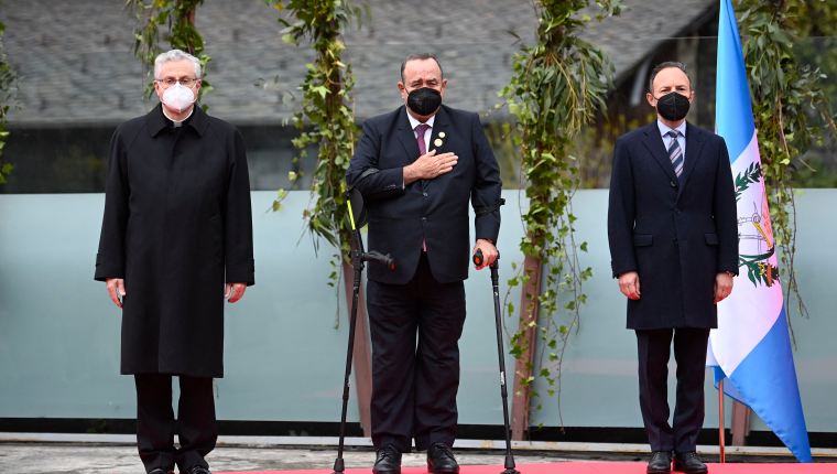 (From L) Co-Prince of Andorra and bishop of Urgell Joan-Enric Vives Sicilia I, President of Guatemala Alejandro Giammattei and Andorra's Chief of Government Xavier Espot pose during the arrival of heads of states for the XXVII Ibero-American Summit in Andorra la Vella in Andorra on April 20, 2021. (Photo by Lionel BONAVENTURE / AFP)