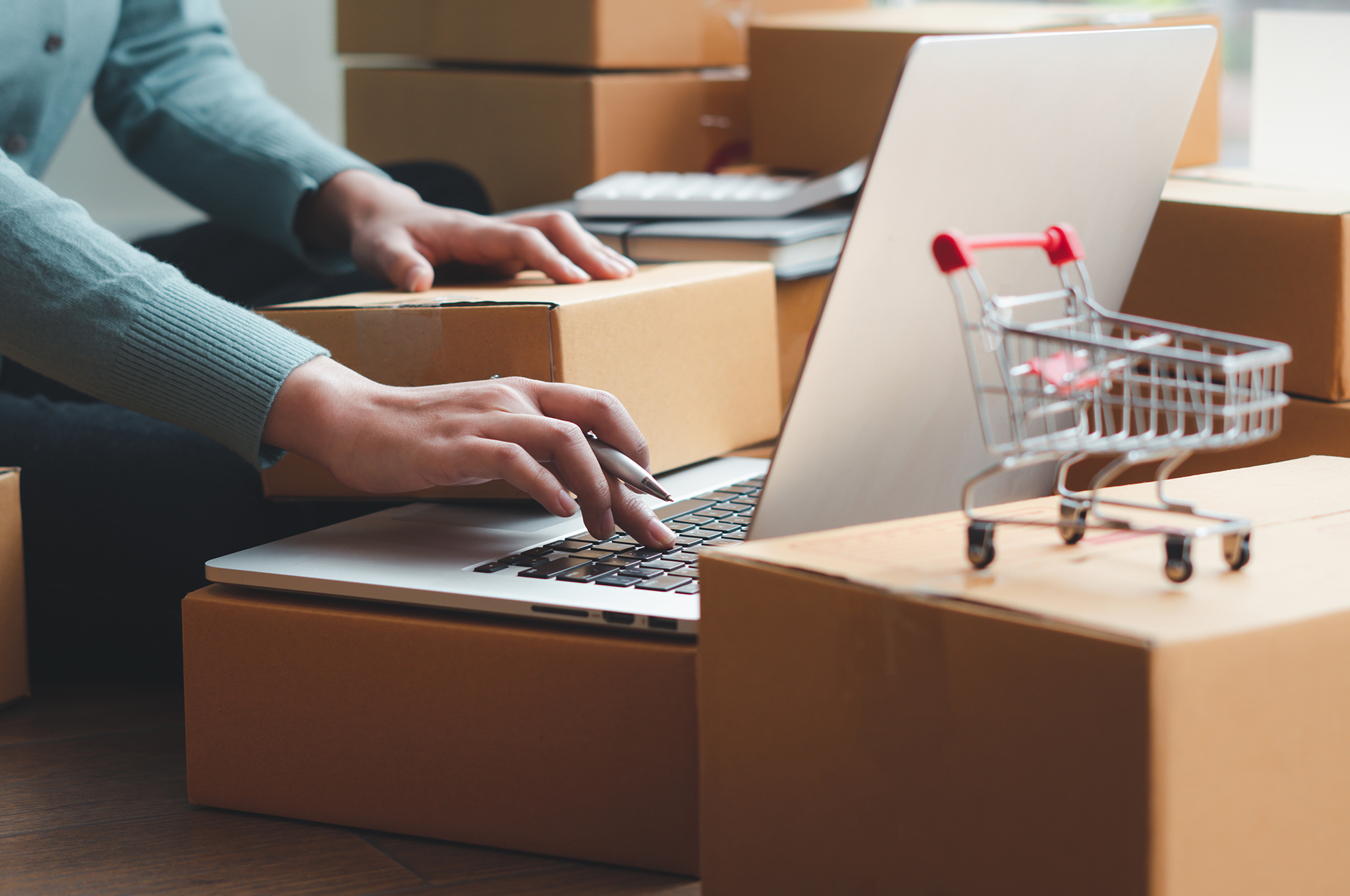 Small Entrepreneurs Start A Home Business By Arranging Goods With Brown Parcel Boxes, Small Home Business Startup Ideas.