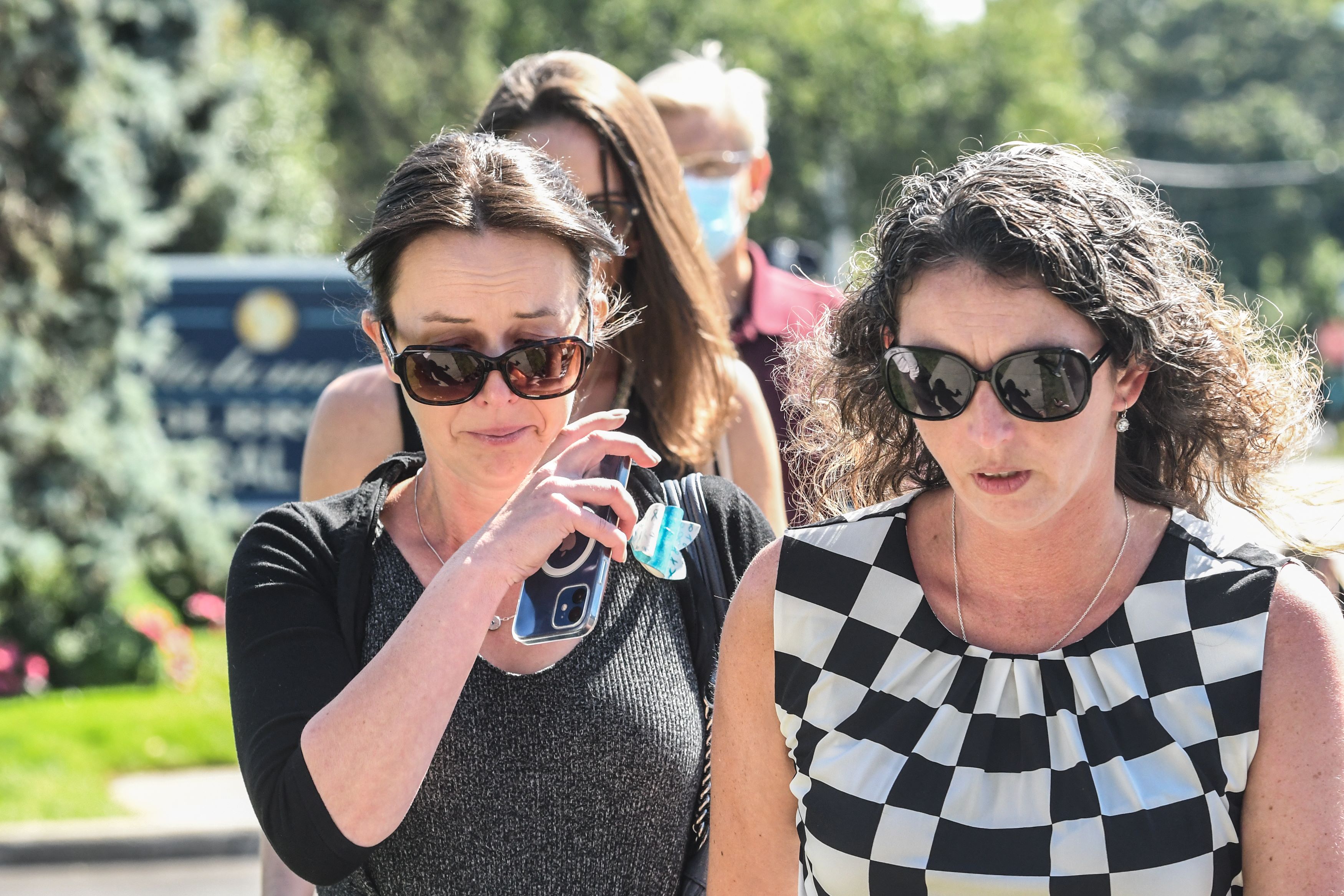 HOLBROOK, NY - SEPTEMBER 26: Mourners gather at a funeral home to pay respects to Gabby Petito on September 26, 2021 in Holbrook, New York. As the search continues into a second week in Florida to find Brian Laundrie, who is a person of interest, the family of Gabby Petito holds a public funeral in her hometown of Long Island. Stephanie Keith/Getty Images/AFP == FOR NEWSPAPERS, INTERNET, TELCOS & TELEVISION USE ONLY ==