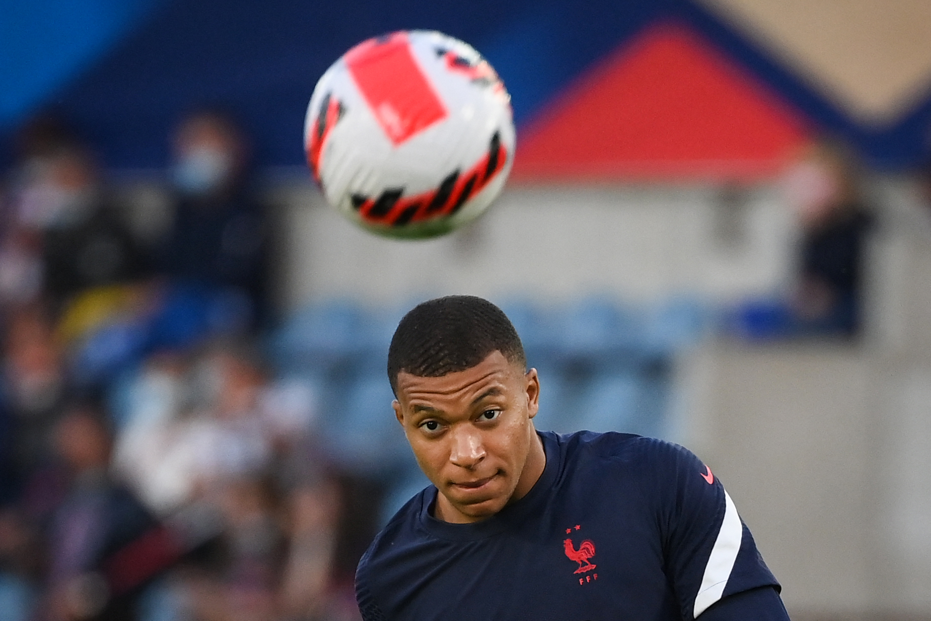 France's forward Kylian Mbappe warms up prior to the FIFA World Cup Qatar 2022 qualification Group D football match between France and Bosnia-Herzegovina, at the Meineau stadium in Strasbourg, eastern France, on September 1, 2021. (Photo by FRANCK FIFE / AFP)