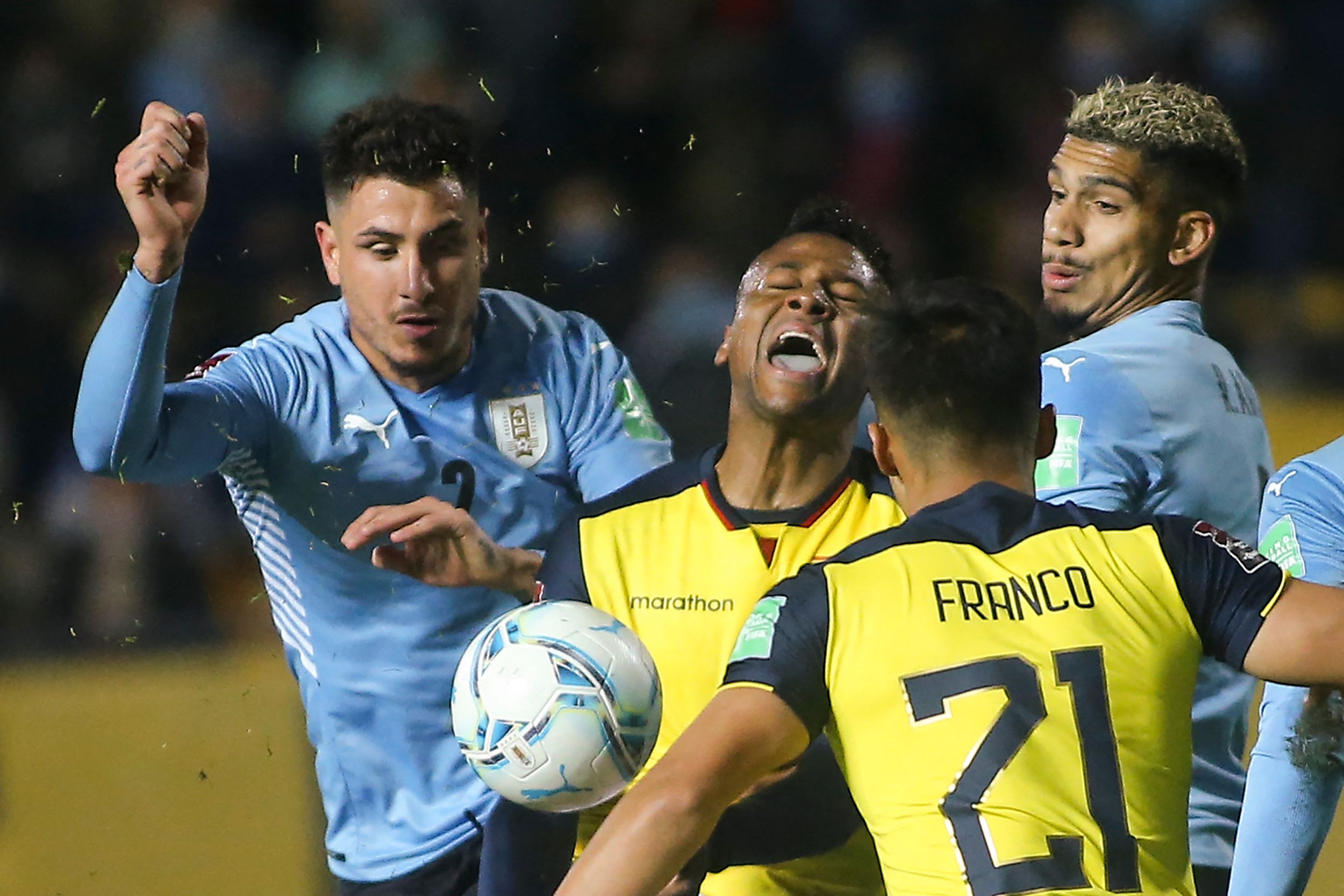 Uruguay's Jose Maria Gimenez (L) and Ecuador's Michael Estrada vie for the ball during their South American qualification football match for the FIFA World Cup Qatar 2022 at the Campeon del Siglo stadium in Montevideo on September 9, 2021. (Photo by Ernesto Ryan / POOL / AFP)