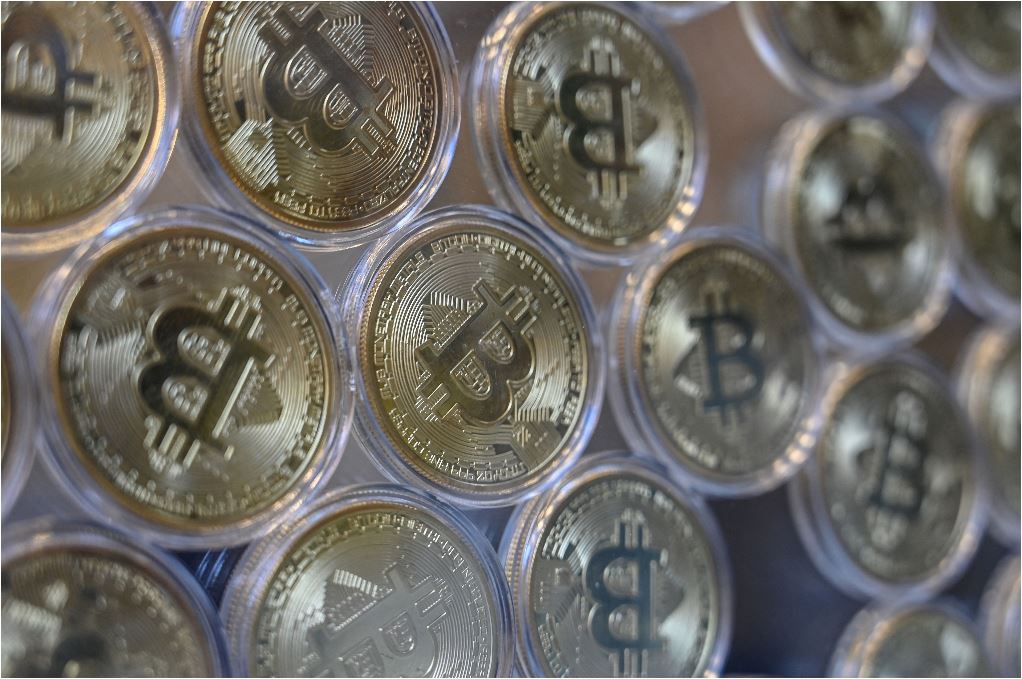 Pl Plus organizó el conversatorio Los negocios después del bitcóin en El Salvador. (Foto Prensa Libre: AFP)