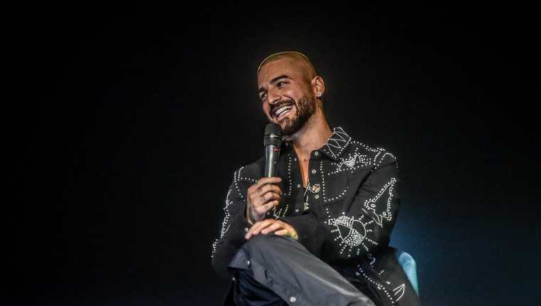 Colombian singer Maluma speaks during a press conference where he announced an upcoming concert in his home city, in Medellin, on November 4, 2021. - The so-called "Papi Juancho Maluma World Tour: Medallo en el Mapa" concert will take place in Medellin on April 30, 2022. (Photo by JOAQUIN SARMIENTO / AFP)