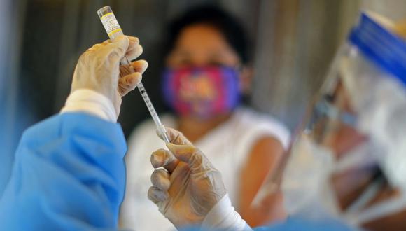 Pastor afirma que quienes se vacunaron contra el coronavirus "deben ser limpiados". (Foto referencial: AFP)