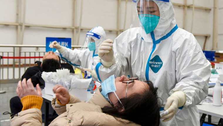 China anunció recientemente que ya circula en su territorio la variante ómicron. (Foto Prensa Libre: AFP)
