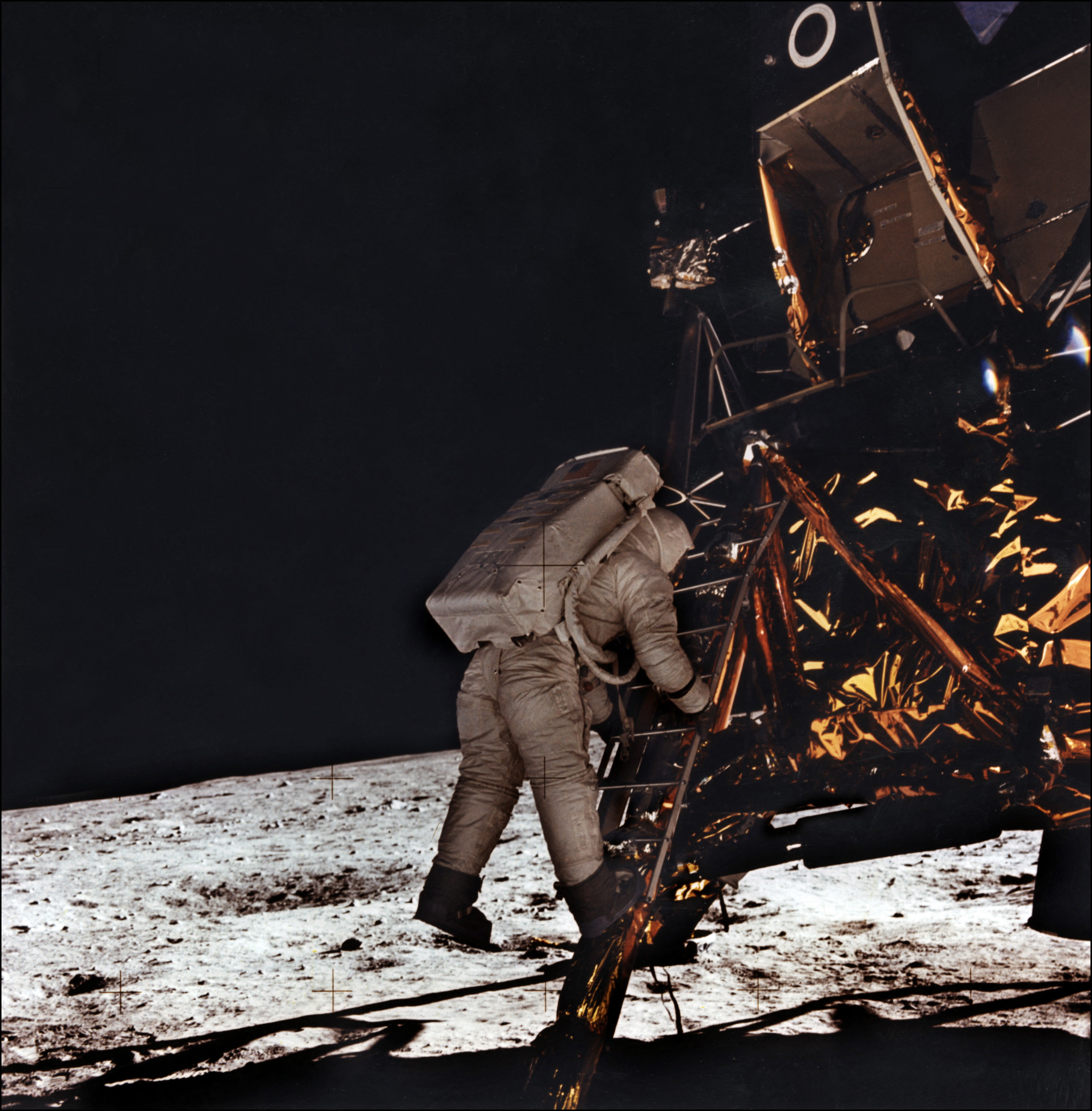 (FILES) This file photo taken on July 21, 1969 shows the astronaut Edwin E. Aldrin descending the steps of the Apollo XI Lunar Module (LM) to walk on the moon. (Photo by NASA / AFP)