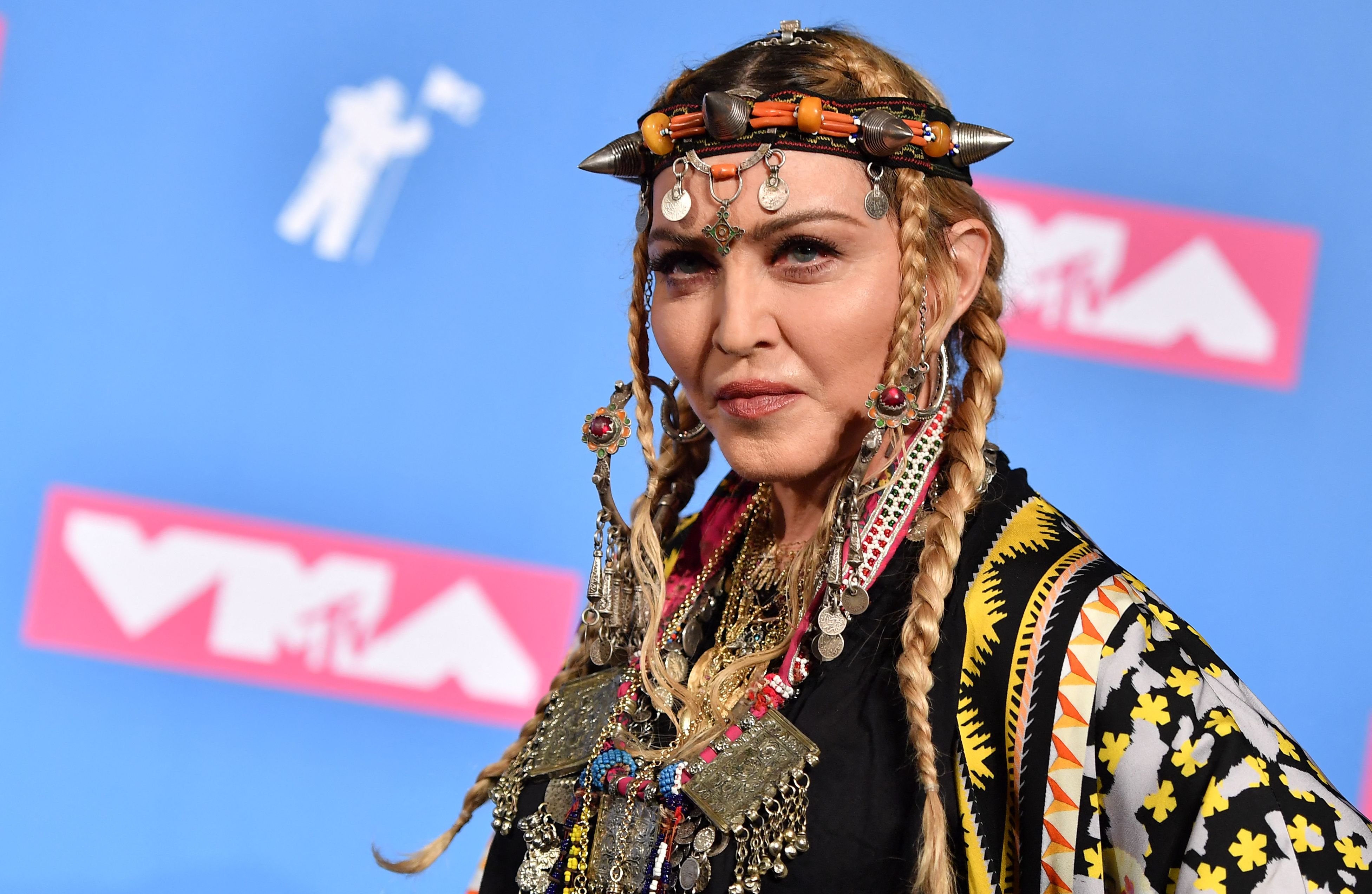 (FILES) In this file photo taken on August 21, 2018, US singer Madonna poses in the press room at the 2018 MTV Video Music Awards at Radio City Music Hall in New York City. - Madonna is among several big names in music to have spoken out following Russia's military invasion on Ukraine. (Photo by ANGELA WEISS / AFP)