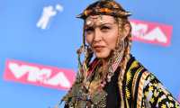 (FILES) In this file photo taken on August 21, 2018, US singer Madonna poses in the press room at the 2018 MTV Video Music Awards at Radio City Music Hall in New York City. - Madonna is among several big names in music to have spoken out following Russia's military invasion on Ukraine. (Photo by ANGELA WEISS / AFP)