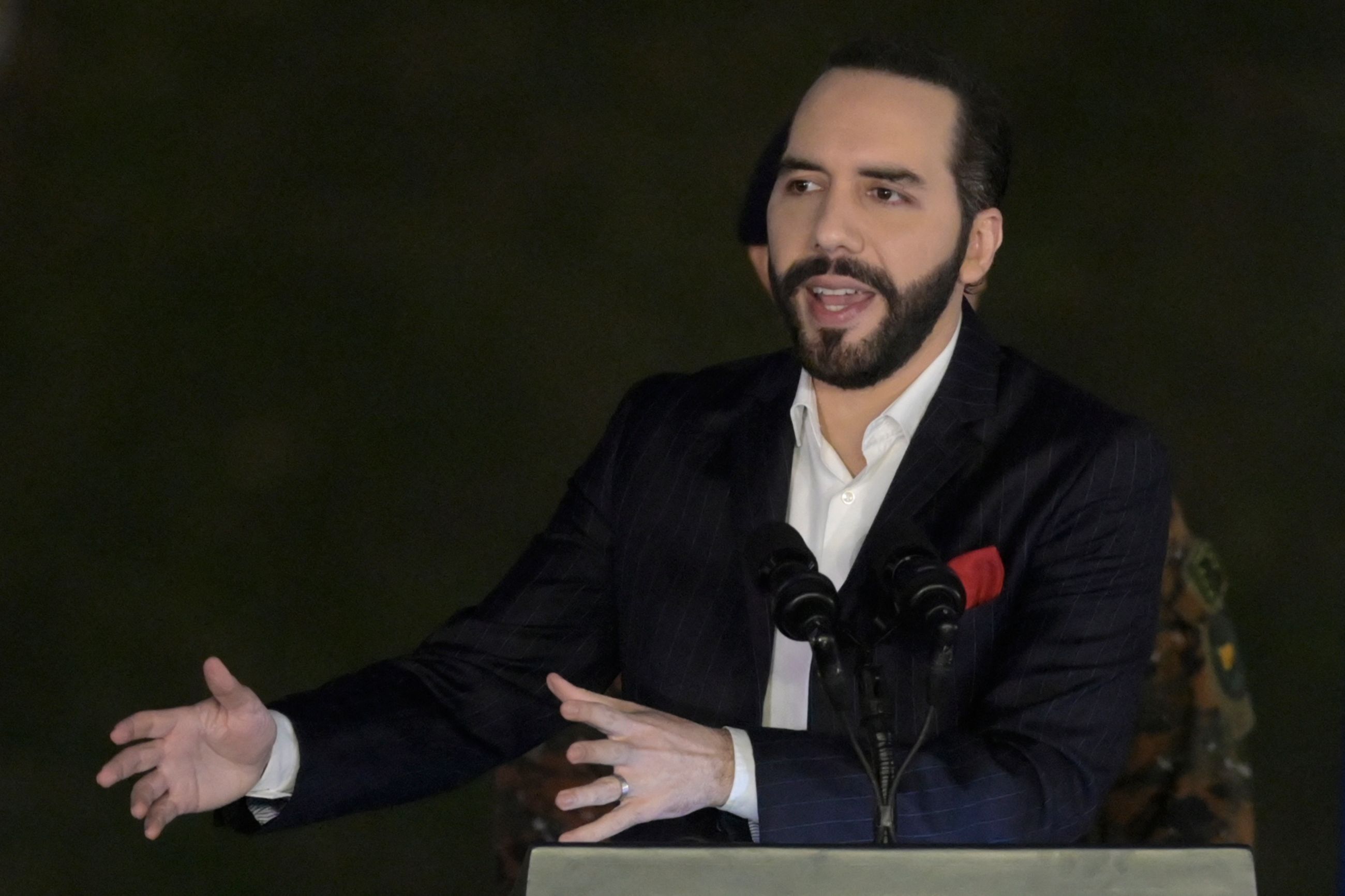 Salvadoran President Nayib Bukele delivers a speech during the graduation of new military personnel, at the Captain General Gerardo Barrios Military School, in Antiguo Cuscatlan, El Salvador, on April 4, 2022. (Photo by Marvin RECINOS / AFP)