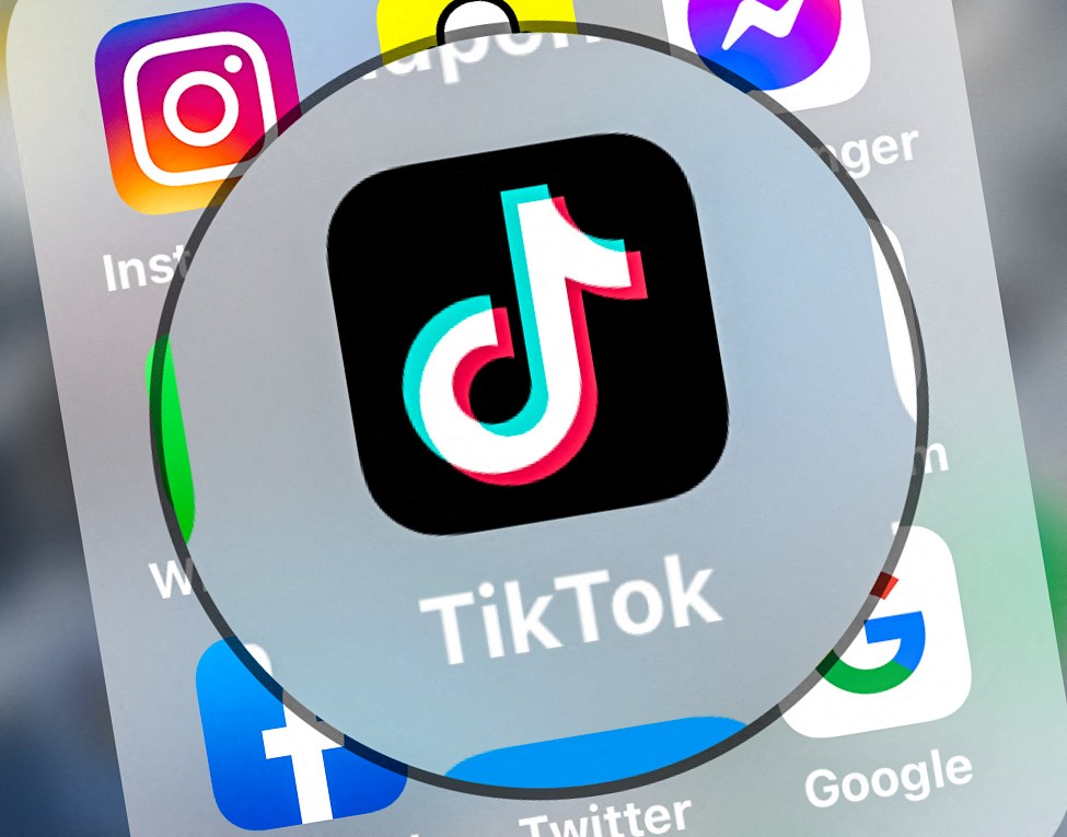 (FILES) This file photo taken on March 24, 2022 shows logo of the networking application TikToK displayed on a tablet in Lille, northern France. - The networking application TikTok says suspending posting of new videos from Russia. (Photo by DENIS CHARLET / AFP)