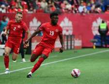 El mediocampista 
 Alphonso Davies, jugador del Bayern Múnich y de la selección canadiense. (Foto Prensa Libre: AFP)