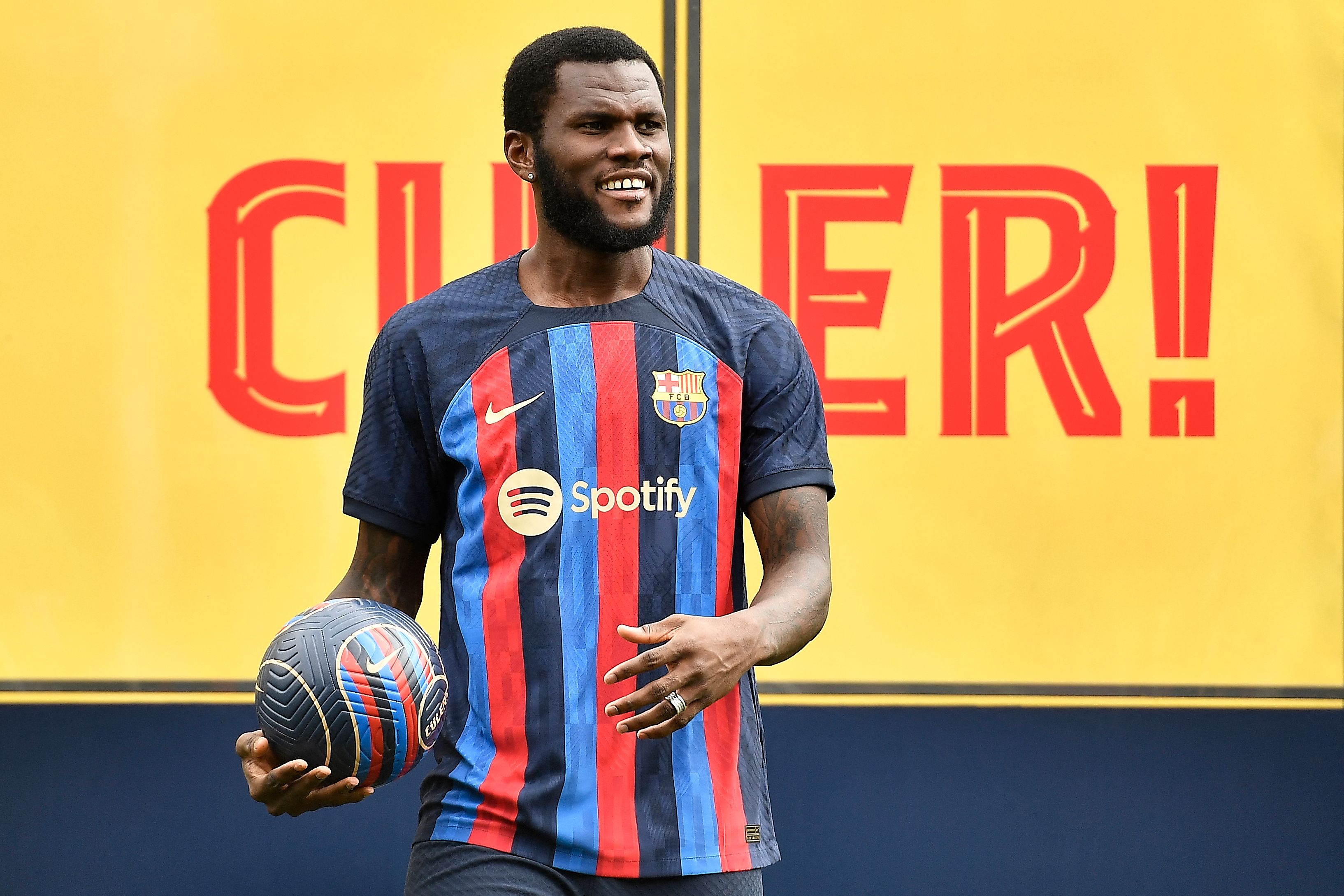 FC Barcelona's new Ivorian midfielder Franck Kessie looks on during his presentation ceremony at the Joan Gamper training ground in Sant Joan Despi, near Barcelona on July 6, 2022. (Photo by Pau BARRENA / AFP)