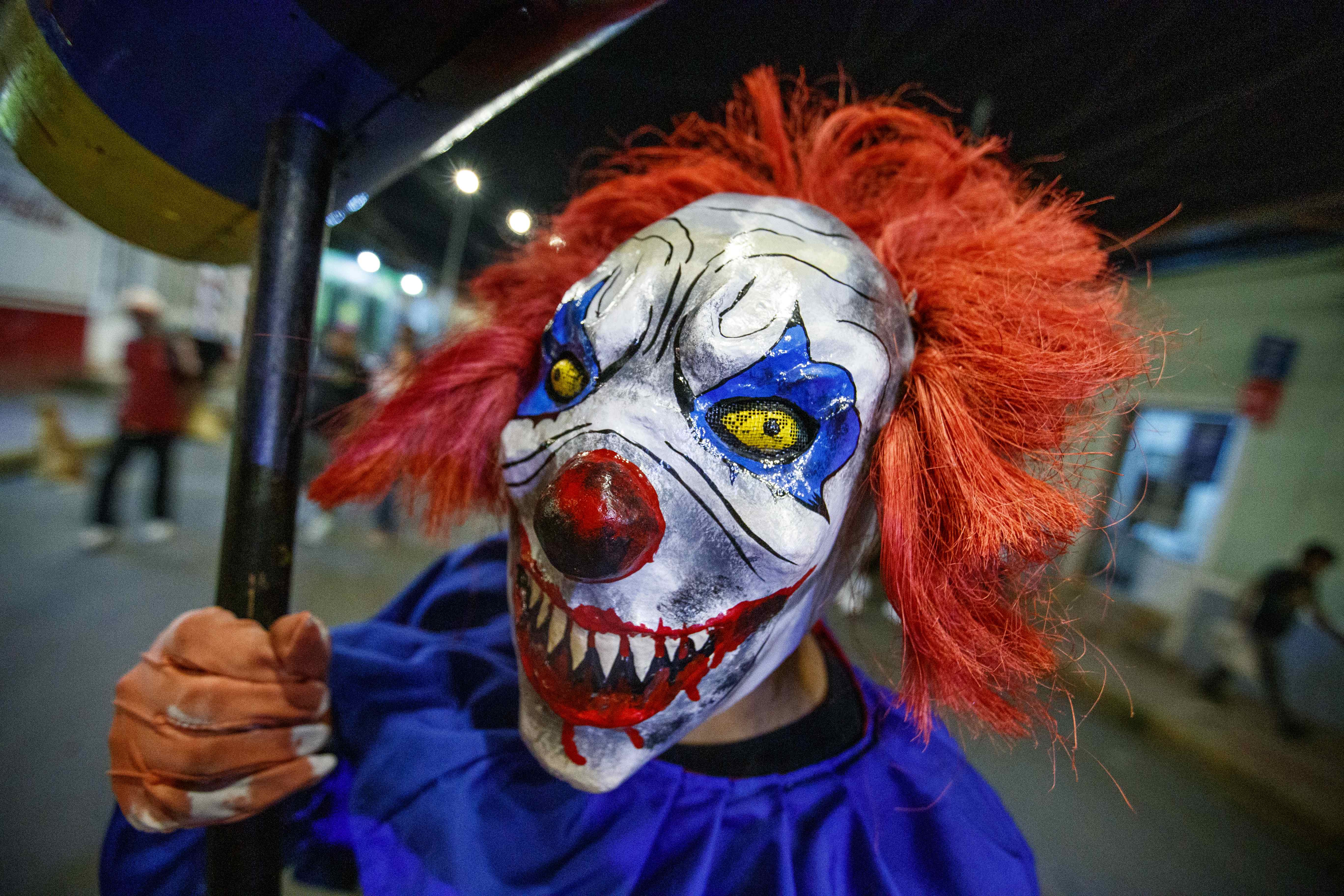 El uso de mascaras y disfraces terroríficos son atractivos de la celebración de Hallowen. Fotografía: EFE.  