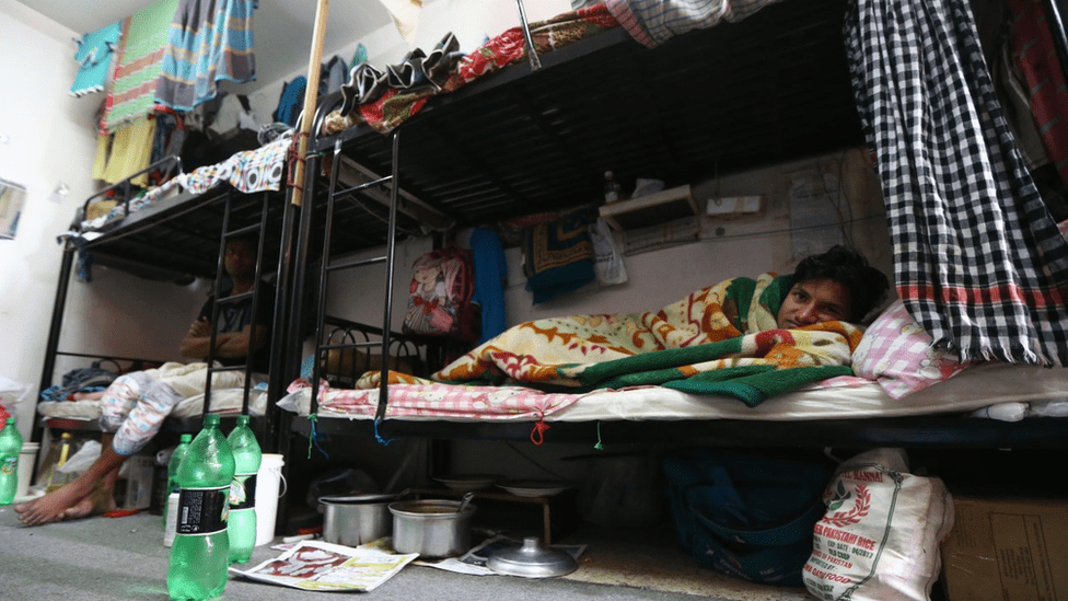 La pobreza afecta especialmente a extranjeros del sudeste asiático sin cualificar.
AFP VIA GETTY IMAGES
