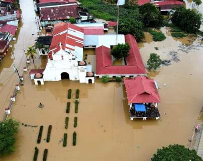 La parroquia de Morales, Izabal, ha sido afectada por inundaciones en varias oportunidades, como lo muestra la fotografía de emergencias anteriores. (Foto Prensa Libre: Cortesía) 