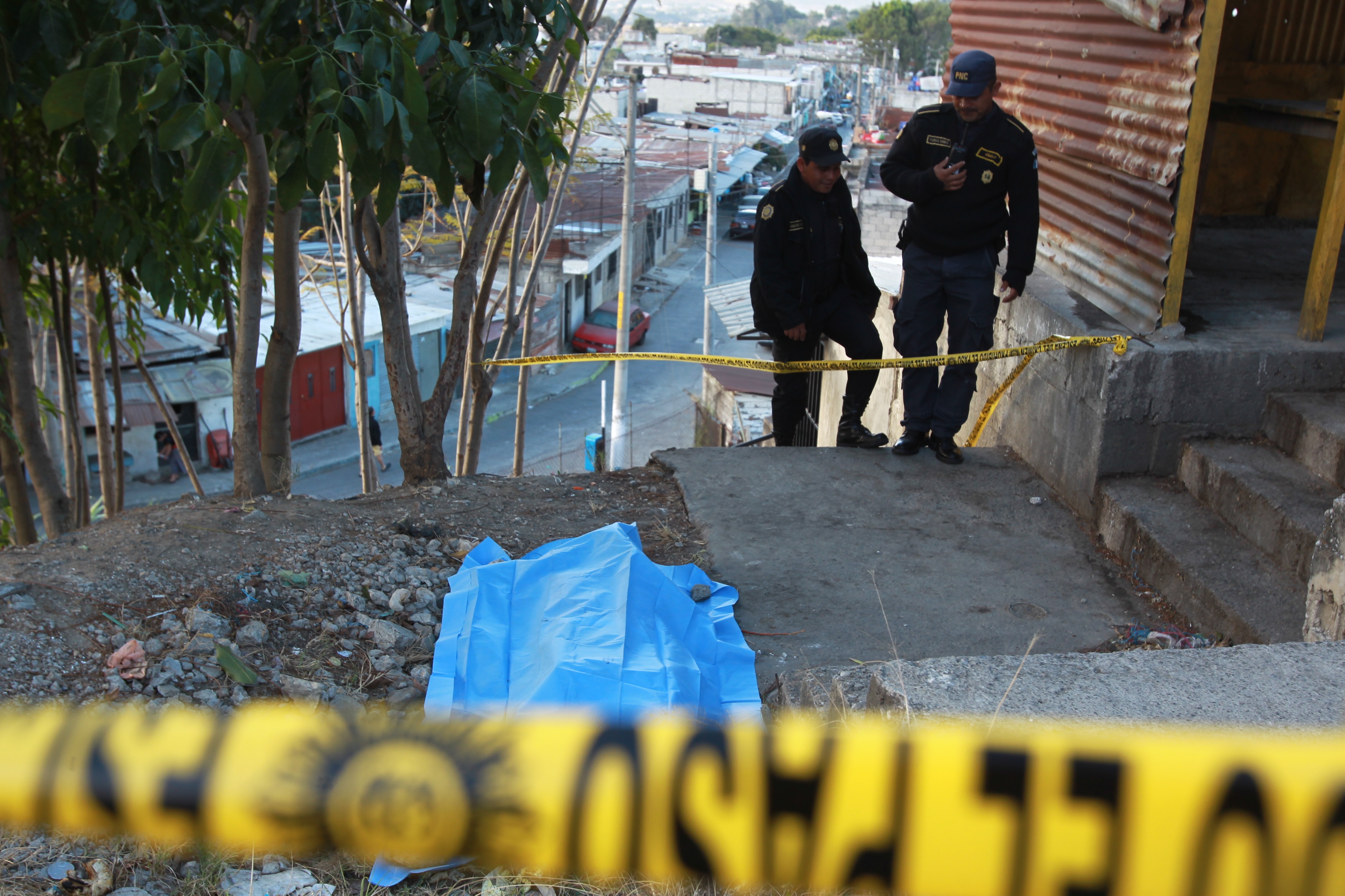 Escena de un crimen ocurrido en la zona 12 de Villa Nueva. (Foto Prensa Libre: Hemeroteca PL)