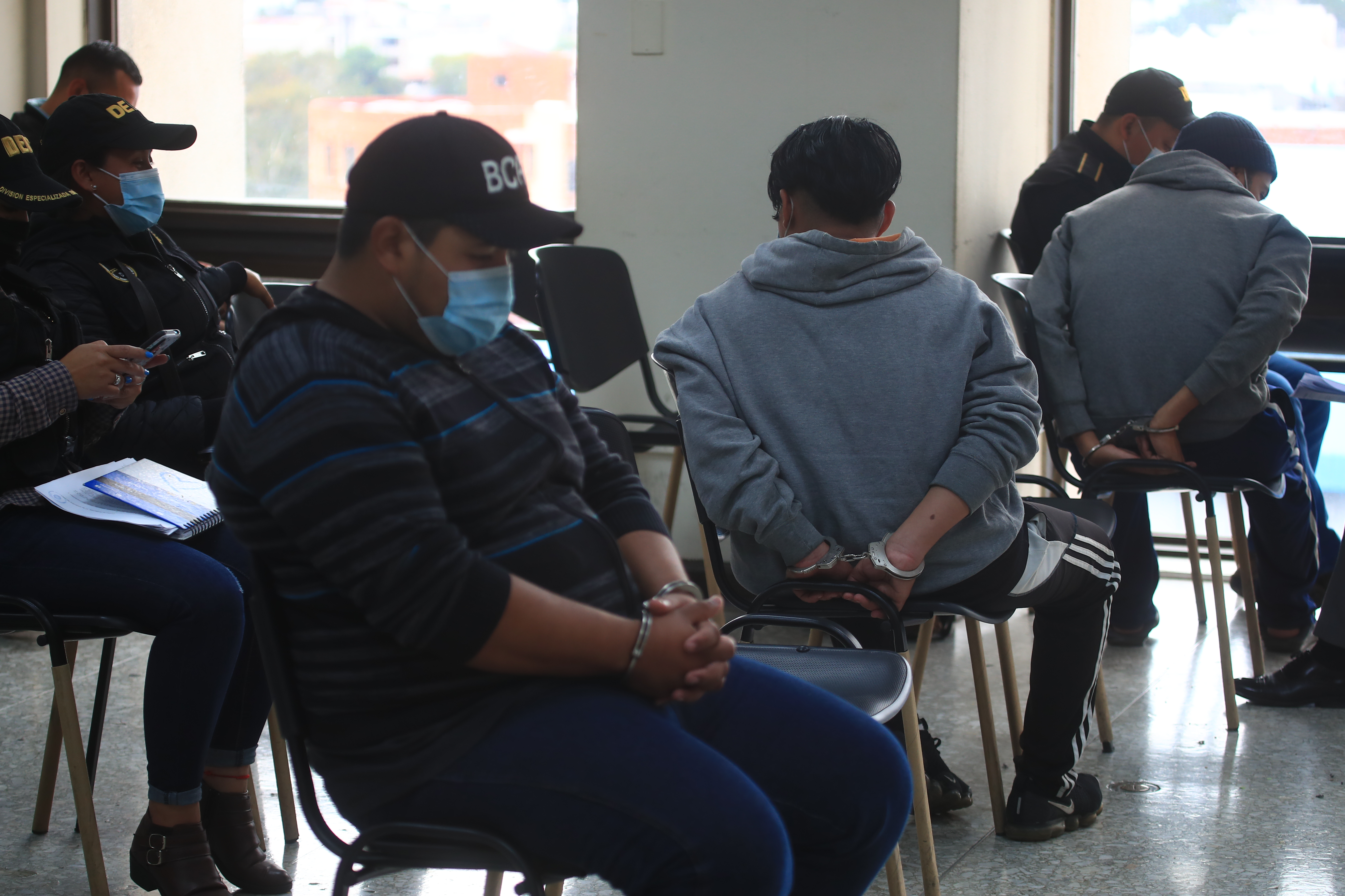 Once personas enfrentan juicio por la muerte del exabogado Jean Paul Pierre y otras cuatro personas. (Foto Prensa Libre: Carlos Hernández) 