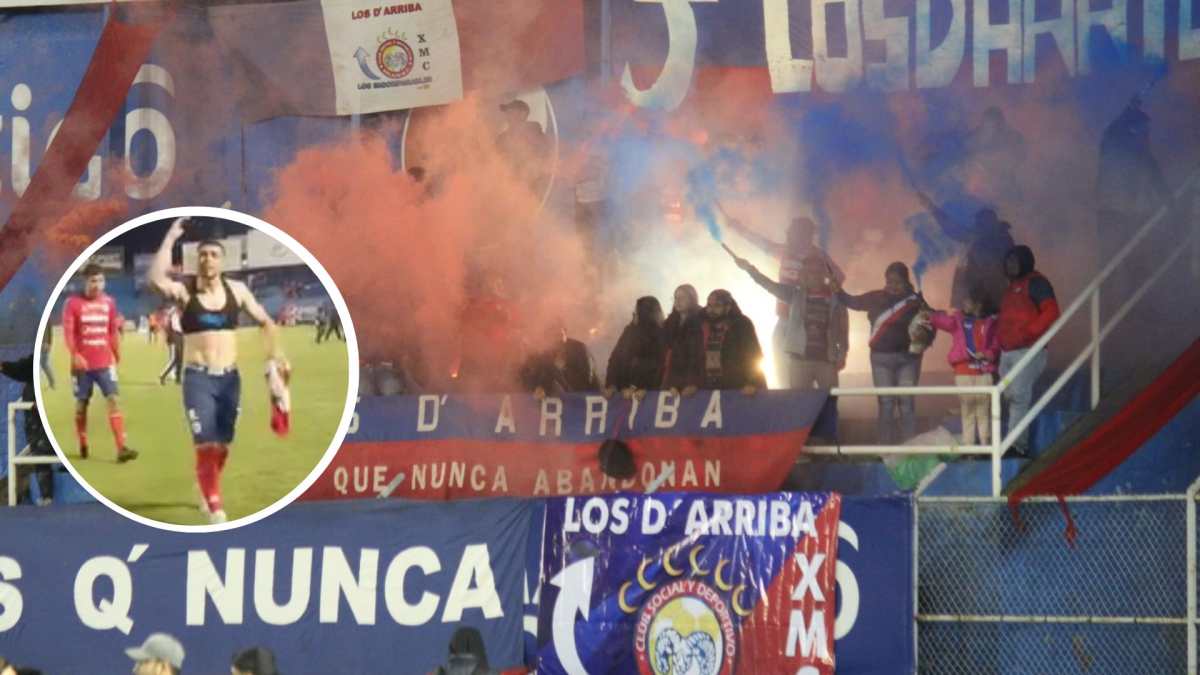 La denominada porra, Los de Arriba, en el estadio Mario Camposeco, la noche del sábado en la derrota ante Antigua. (Foto Prensa Libre: TVO Quetzaltenango)