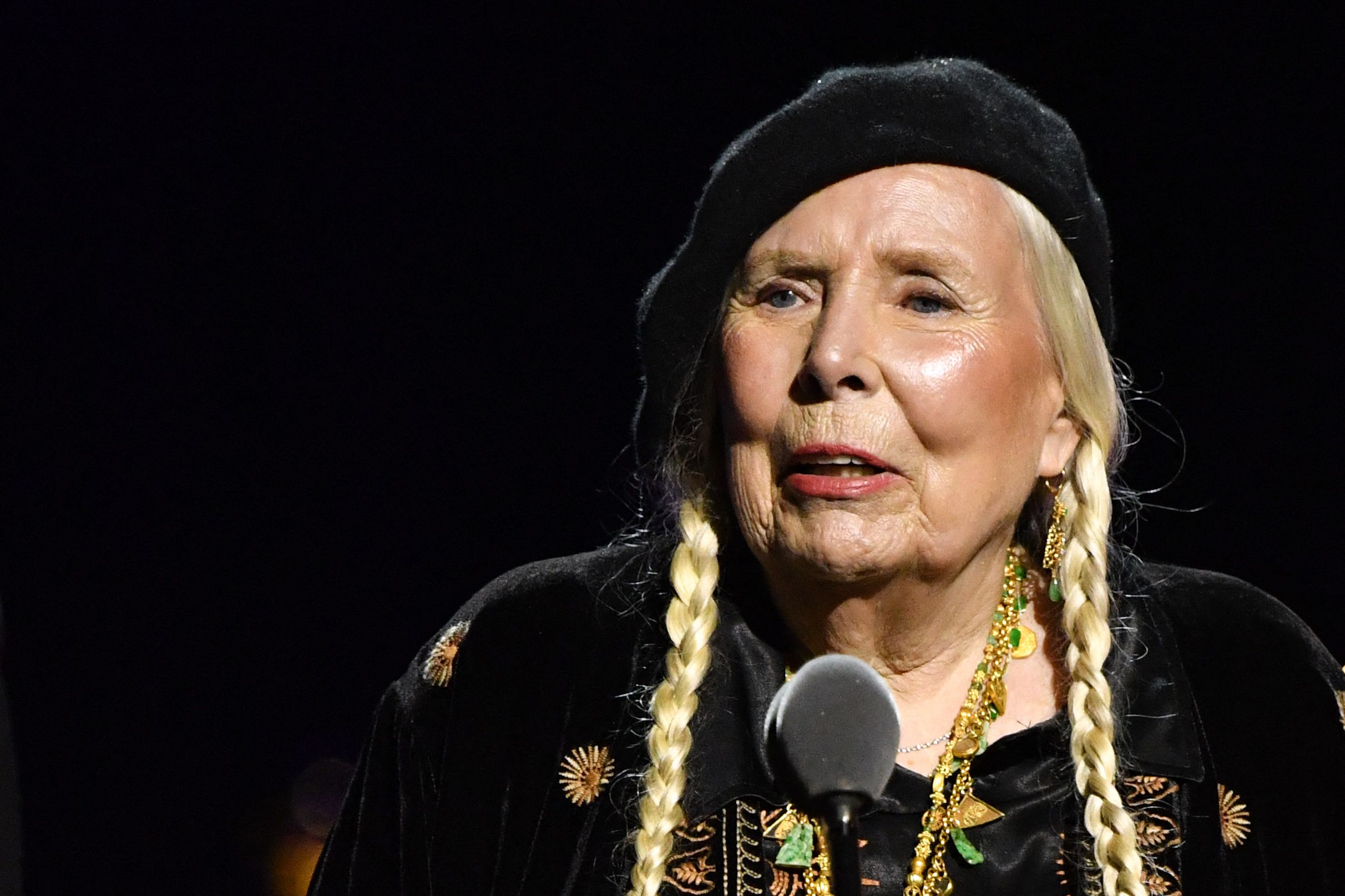 Canadian singer-songwriter Joni Mitchell accepts the "Best Folk Album" award for "Joni Mitchell At Newport [Live]" onstage during the 66th Annual Grammy Awards pre-telecast show at the Crypto.com Arena in Los Angeles on February 4, 2024. (Photo by Valerie Macon / AFP)