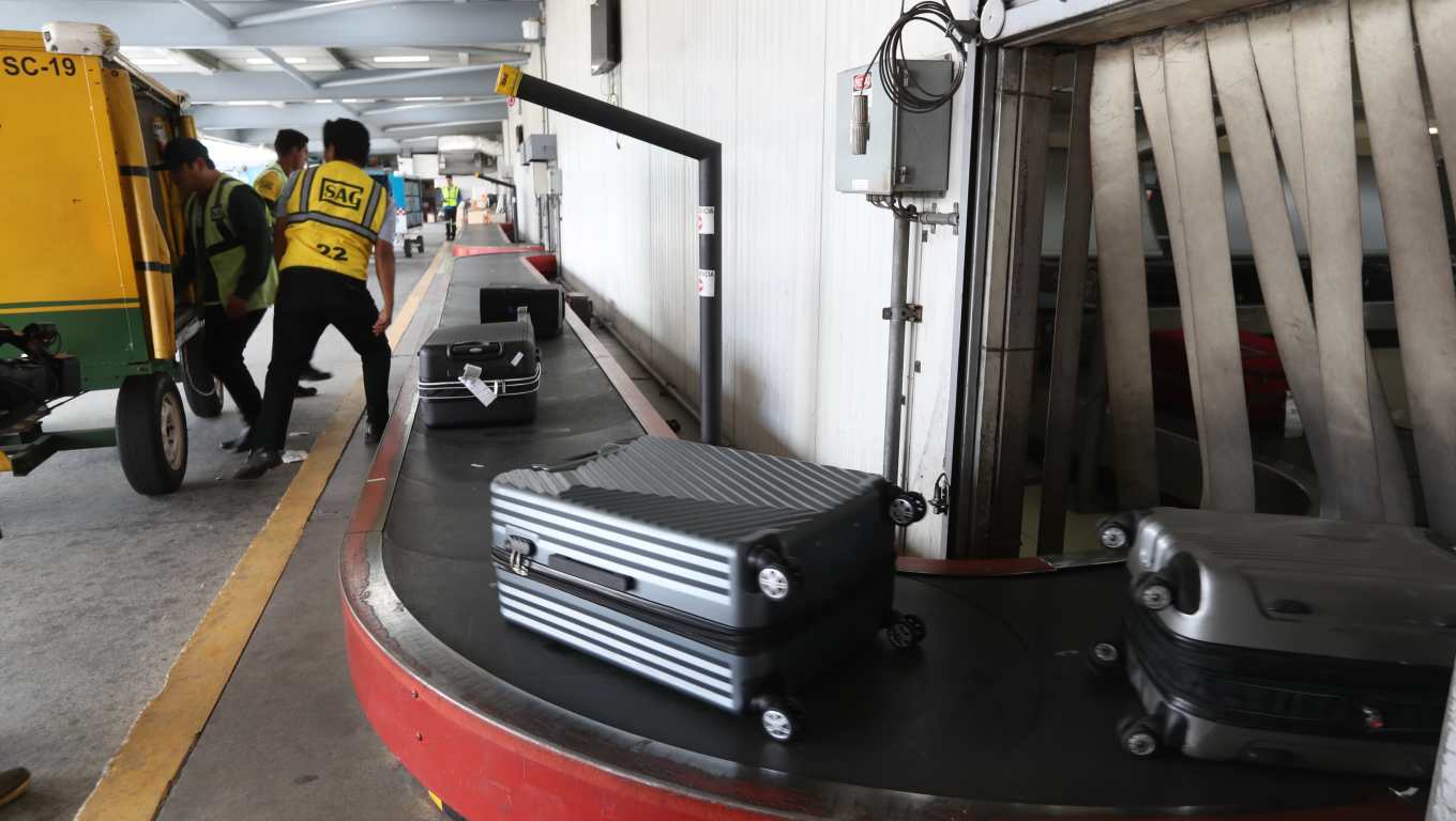 Estas son las bandas donde los pasajeros reciben su equipaje. En los últimos años han dado problemas por la falta de mantenimiento. (Foto Prensa Libre: María Reneé Barrientos Gaytan).