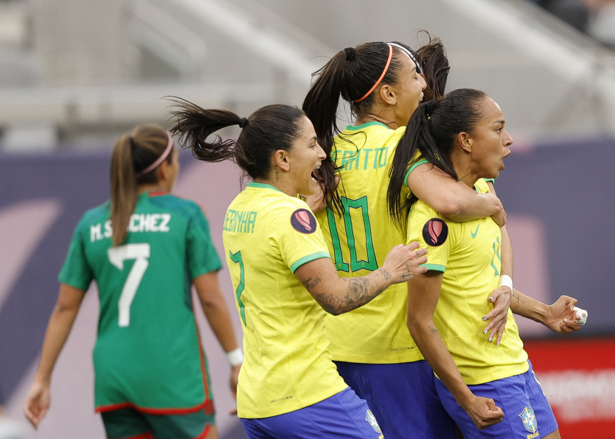 SAN DIEGO, CALIFORNIA - MARCH 06: Adriana Leal Da Silva #11 of Brazil celebrates with Bia Zaneratto #10 of Brazil after scoring against Mexico during the first half at Snapdragon Stadium on March 06, 2024 in San Diego, California.   Carmen Mandato/Getty Images/AFP (Photo by Carmen Mandato / GETTY IMAGES NORTH AMERICA / Getty Images via AFP)